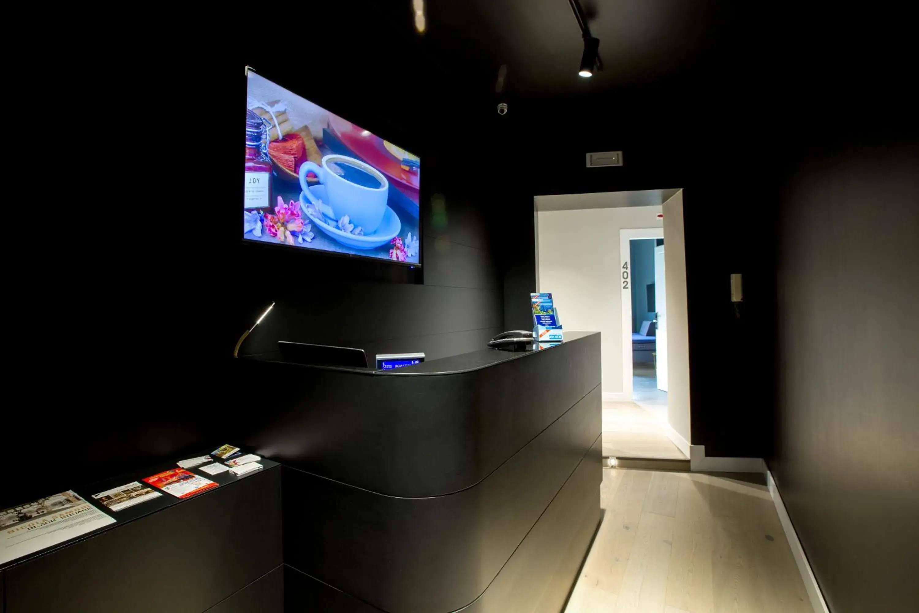 Lobby or reception, TV/Entertainment Center in Casa Pacifico Napoli