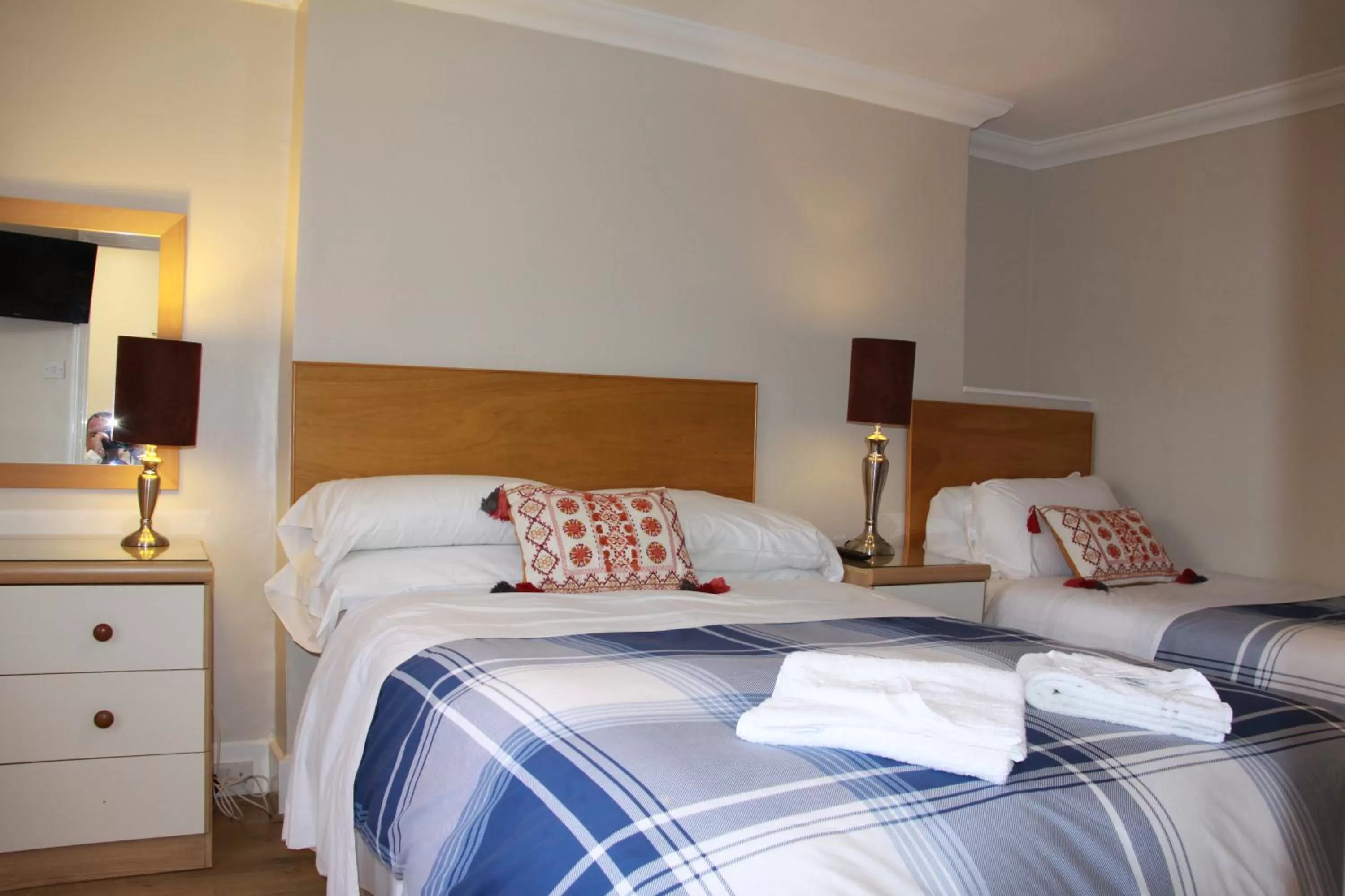 Bed in Ambassador Hotel