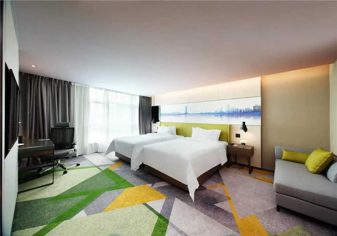 Bed in Hampton by Hilton Guangzhou Tianhe Sports Center