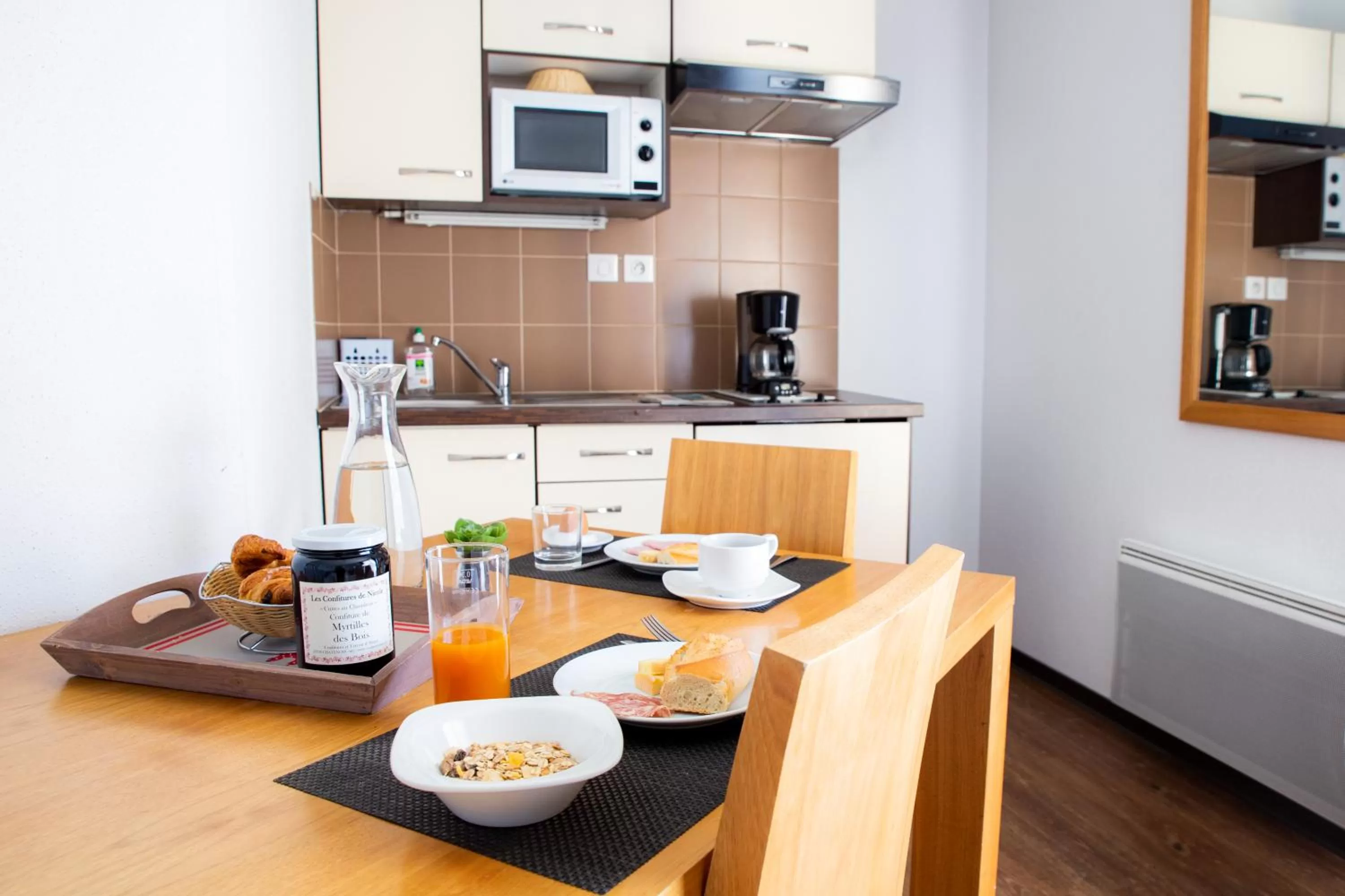 Kitchen or kitchenette in Comfort Aparthotel Mutzig Portes d'Alsace