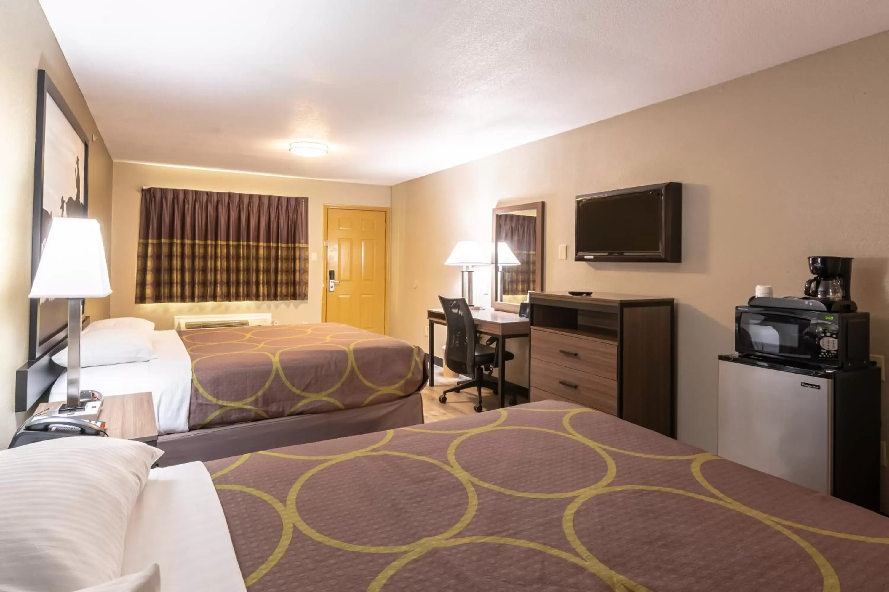 Bed in Super 8 by Wyndham Dallas East