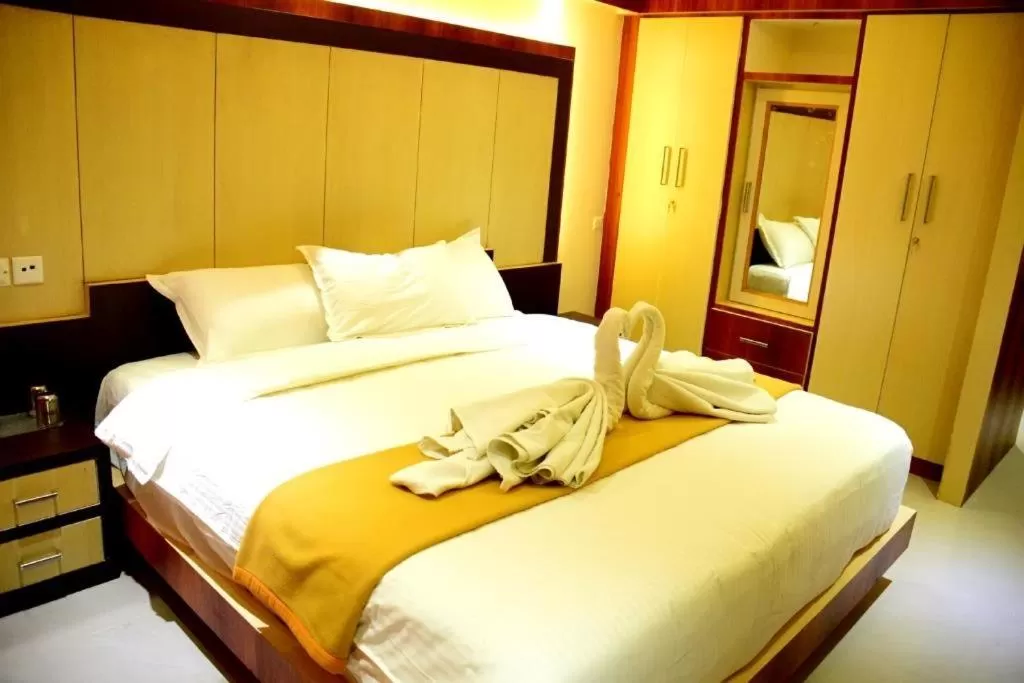 Bed in Star MSR Residency