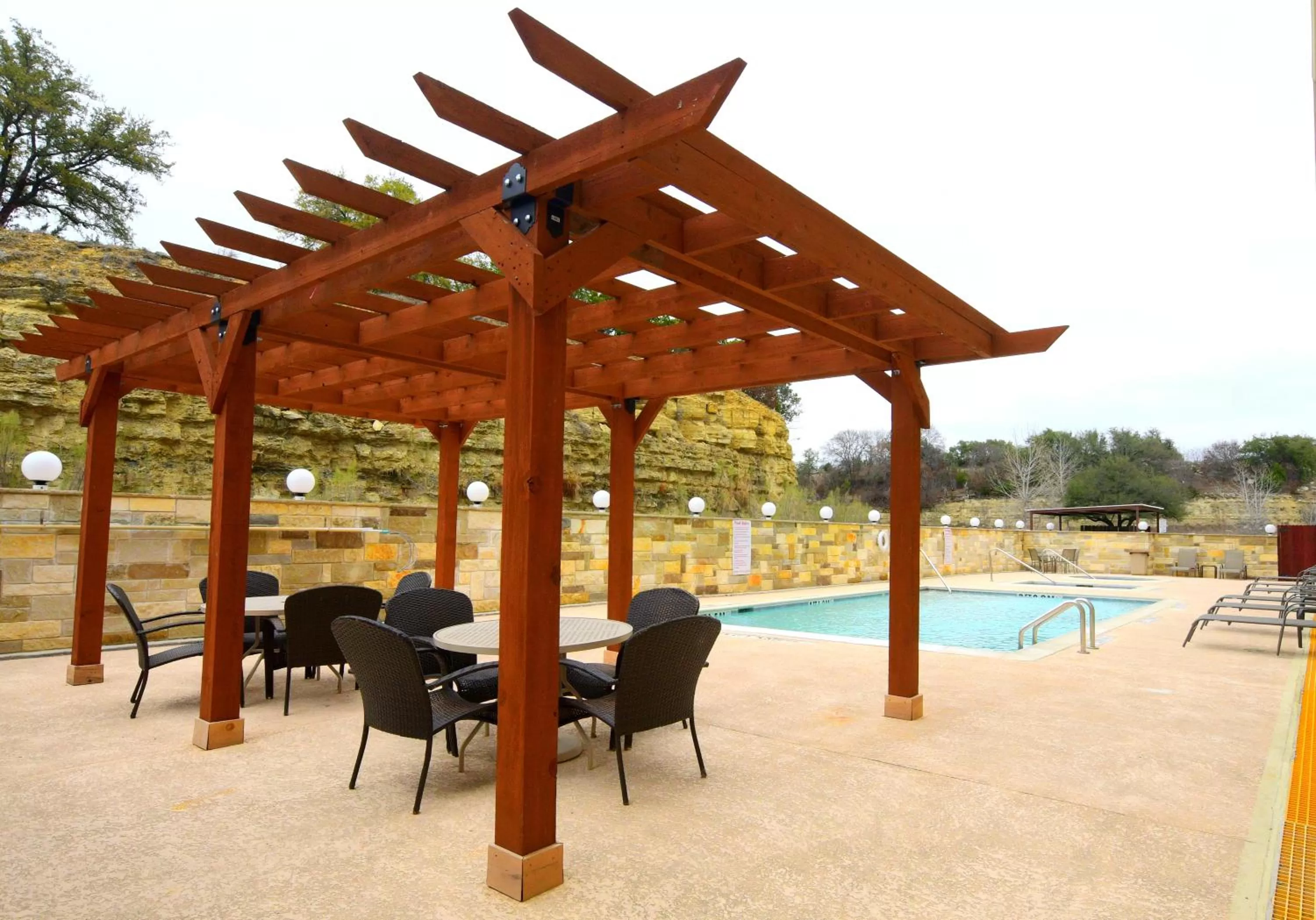 Swimming pool in Baymont Inn & Suites by Wyndham Glen Rose
