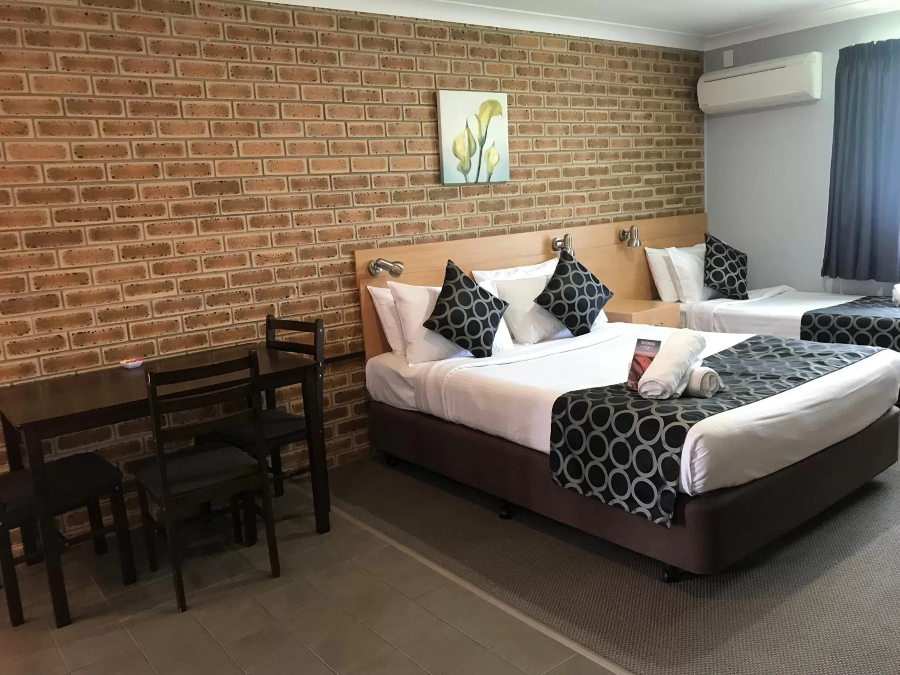 Bed in Jumbuck Motor Inn