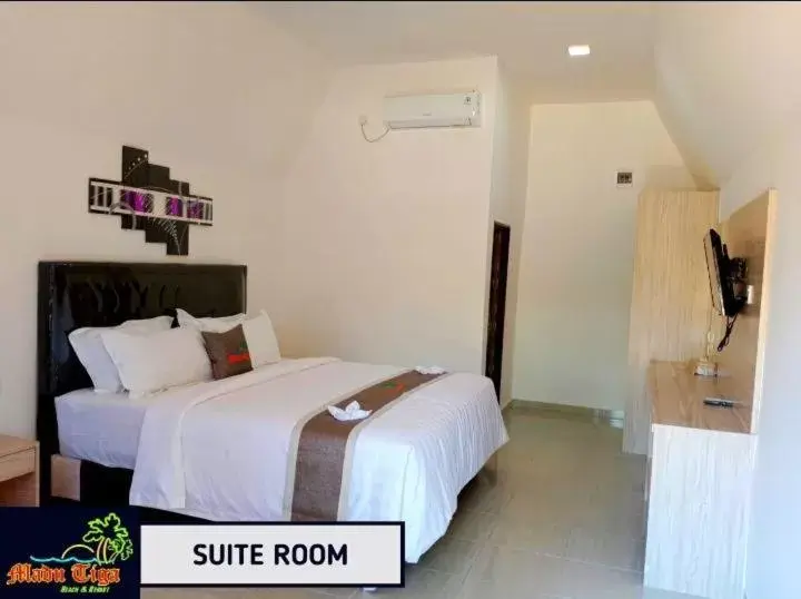 Bedroom in Madu Tiga Beach & Resort