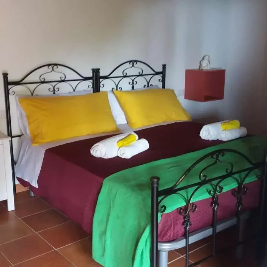 Bed in B&B Le Anthos