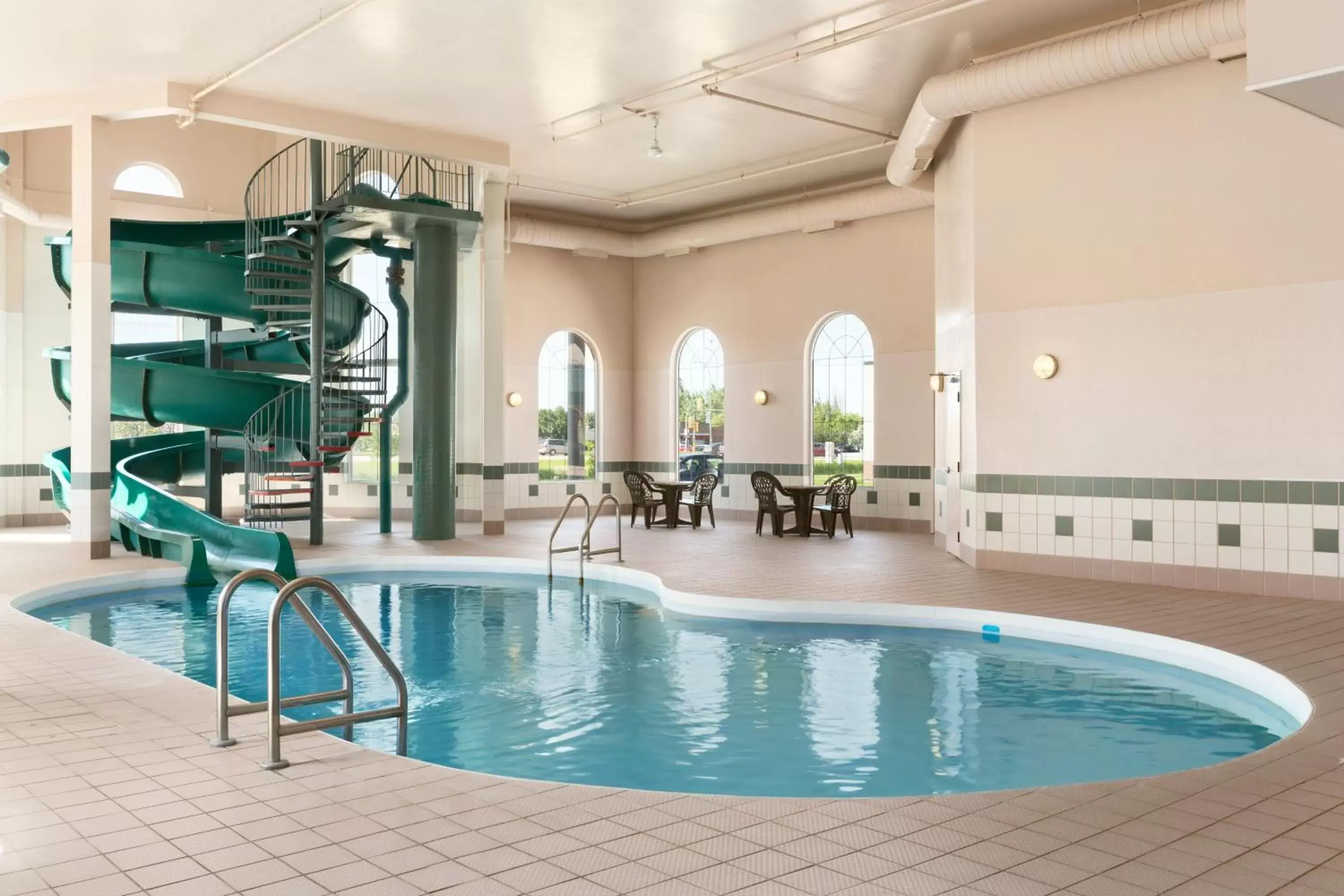 Swimming Pool in Days Inn & Suites by Wyndham Winkler