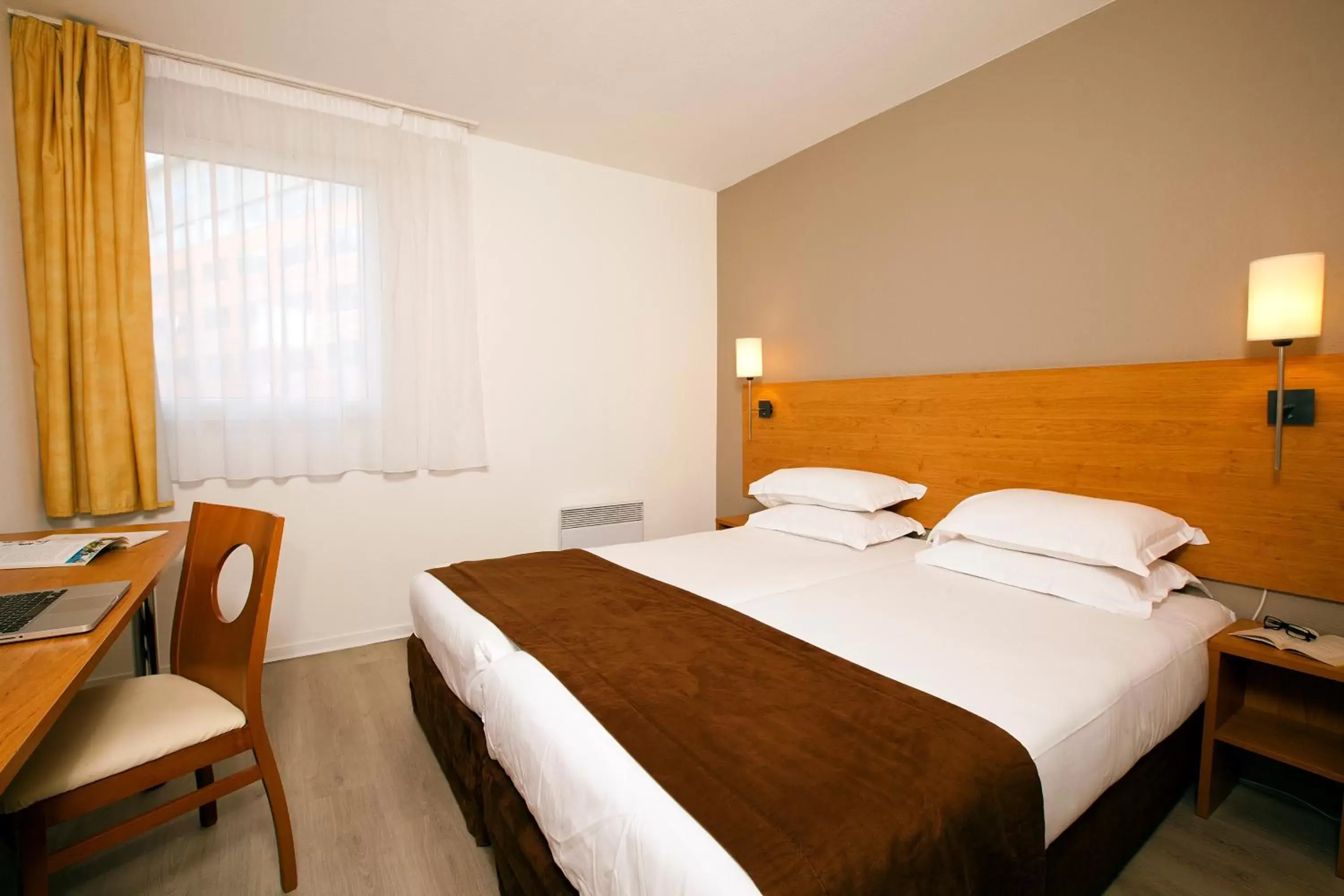 Bedroom, Bed in Séjours & Affaires Montreuil Saint Mandé