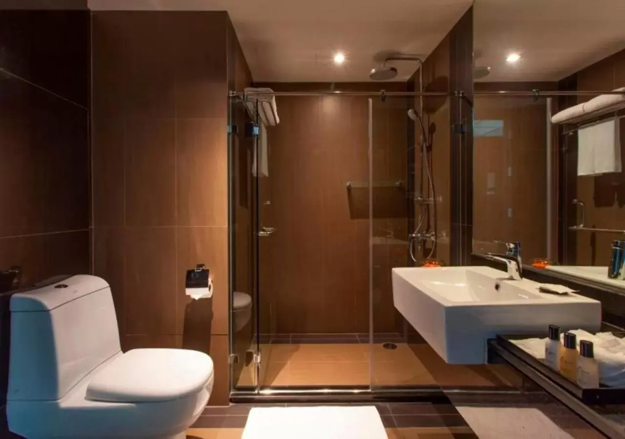 Toilet, Bathroom in Golden Tulip Mandison Suites