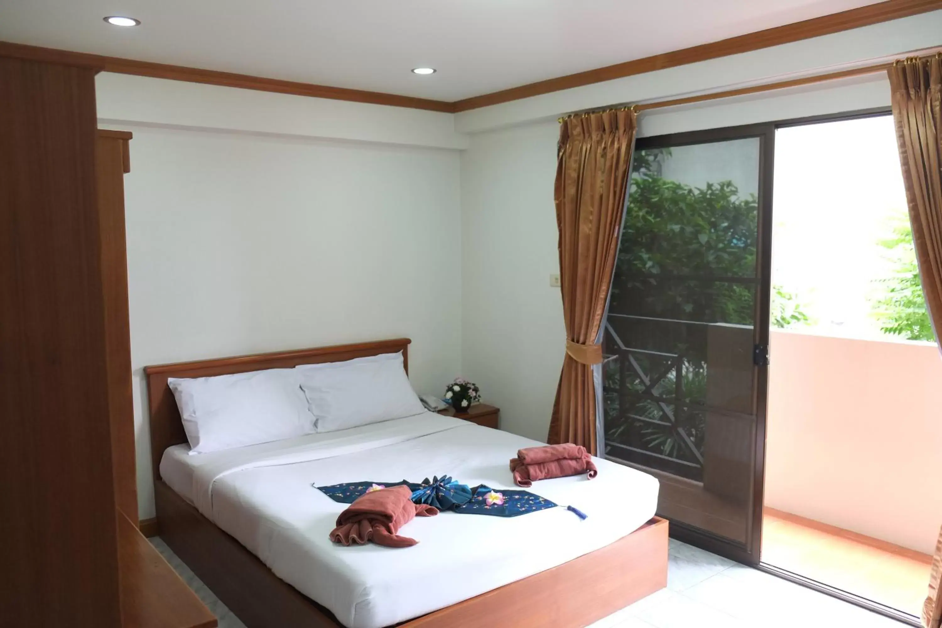 Bed in Diana Garden Resort - SHA Extra Plus