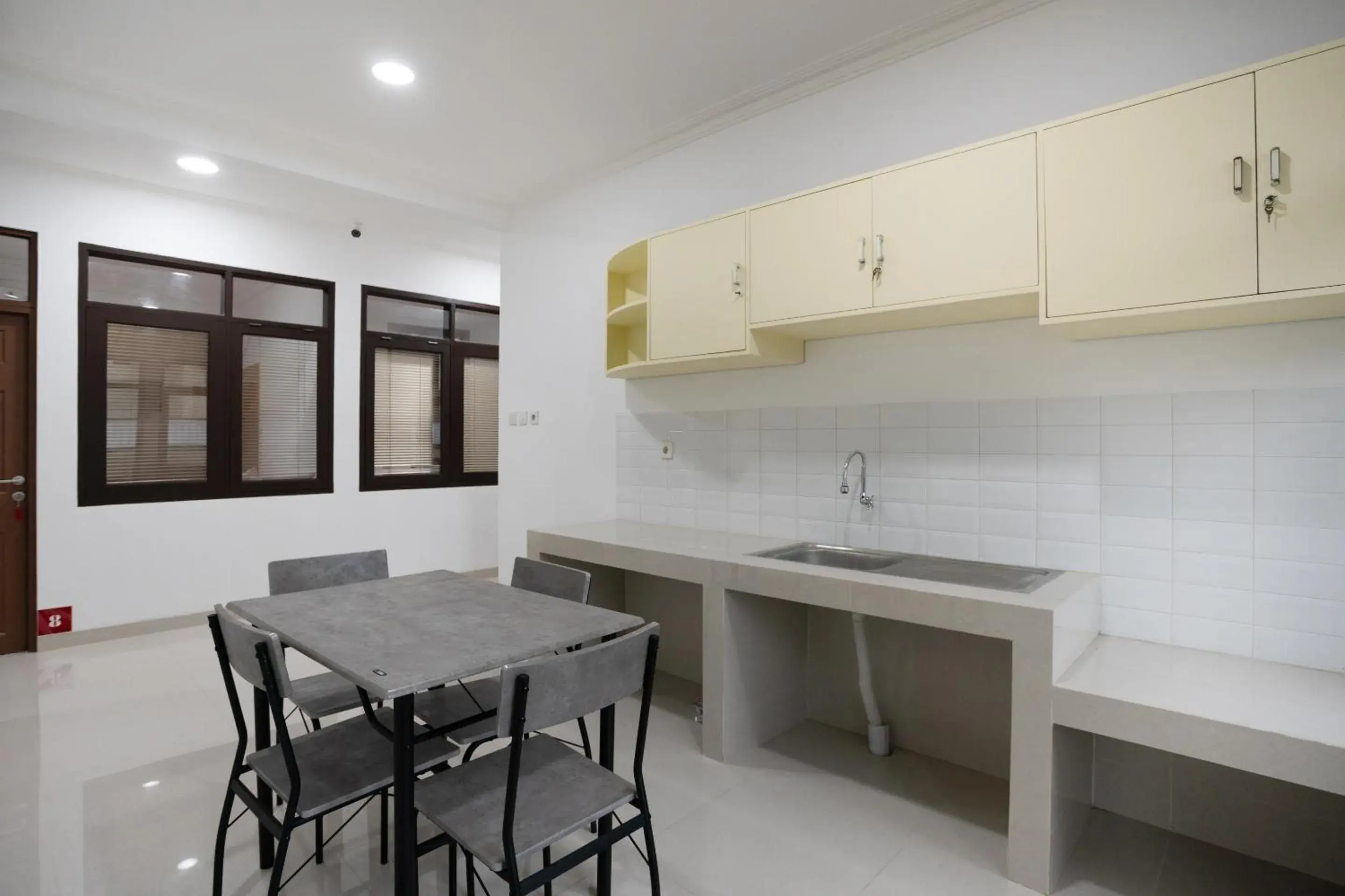 Communal kitchen, Kitchen/Kitchenette in OYO 3209 Hegarbudhi Residence
