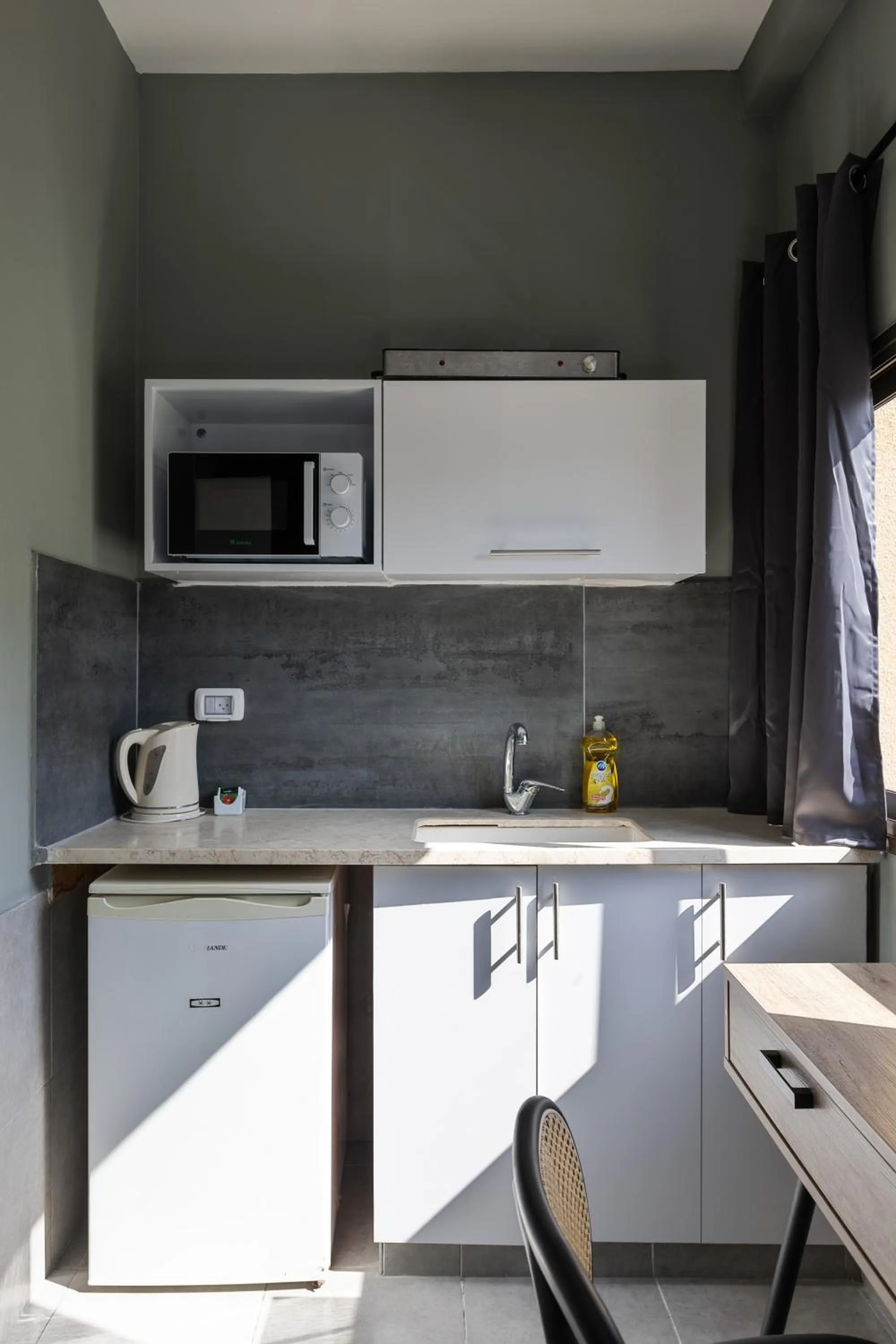 Kitchen or kitchenette in Liber Tel Aviv Sea Shore Suites BY RAPHAEL HOTELS
