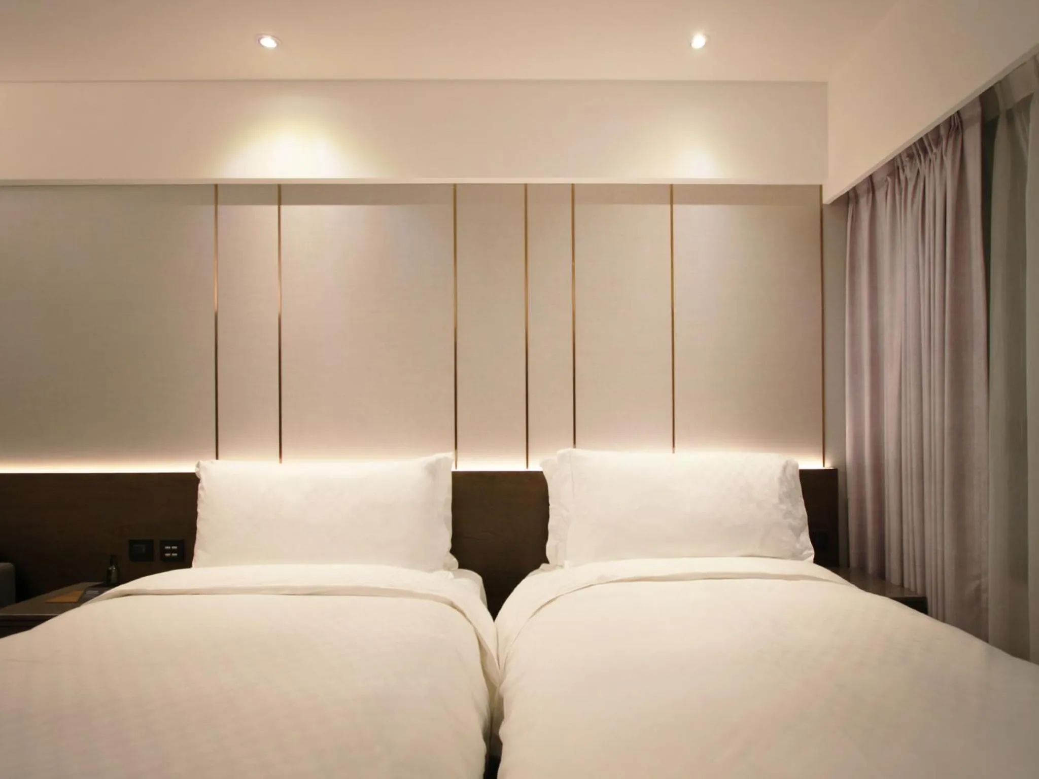 Bed in The Tango Hotel Taipei Linsen