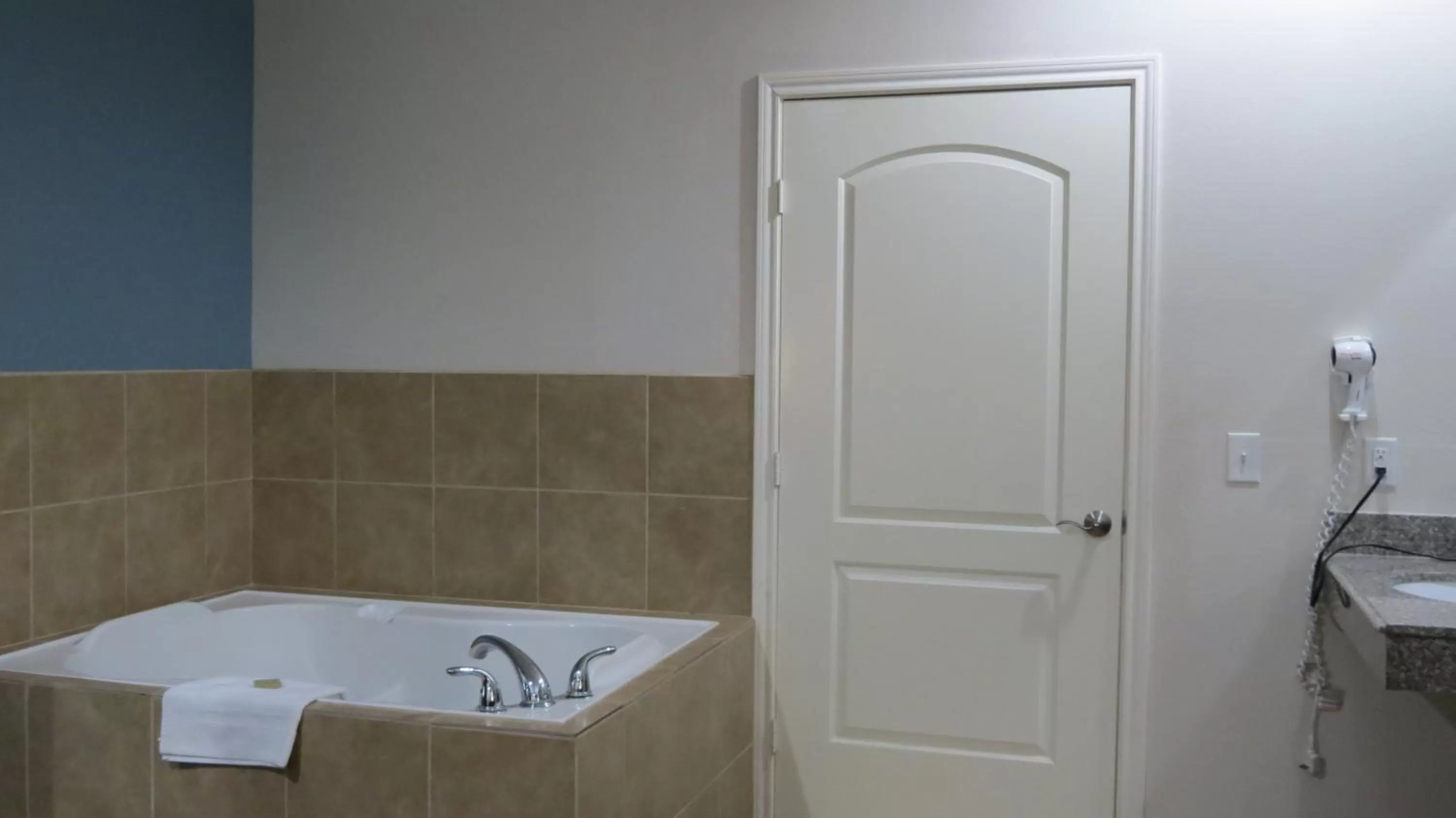 Bathroom in Super 8 by Wyndham Houston North I-45