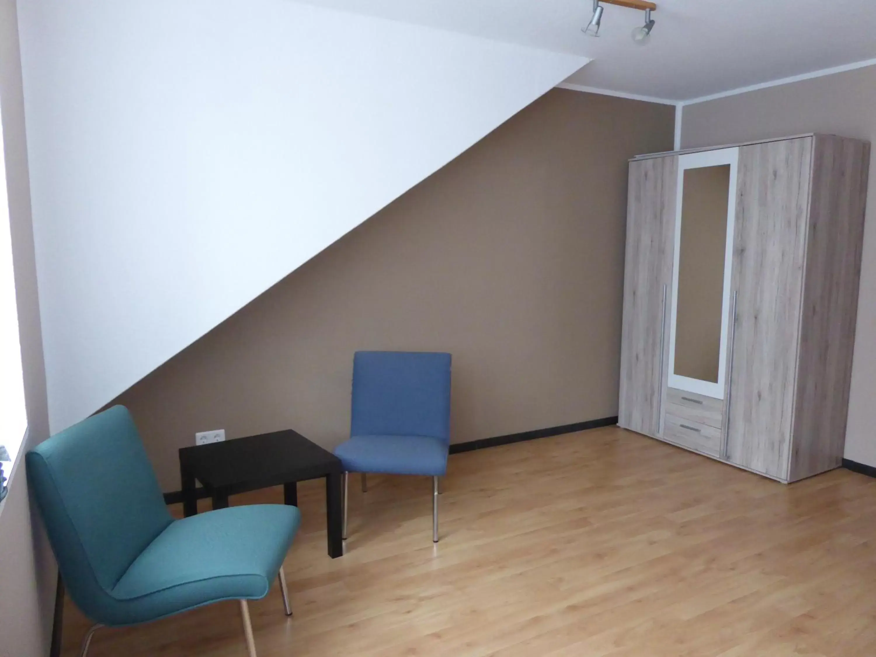 Bedroom, Seating Area in Hotel Am Sportpark