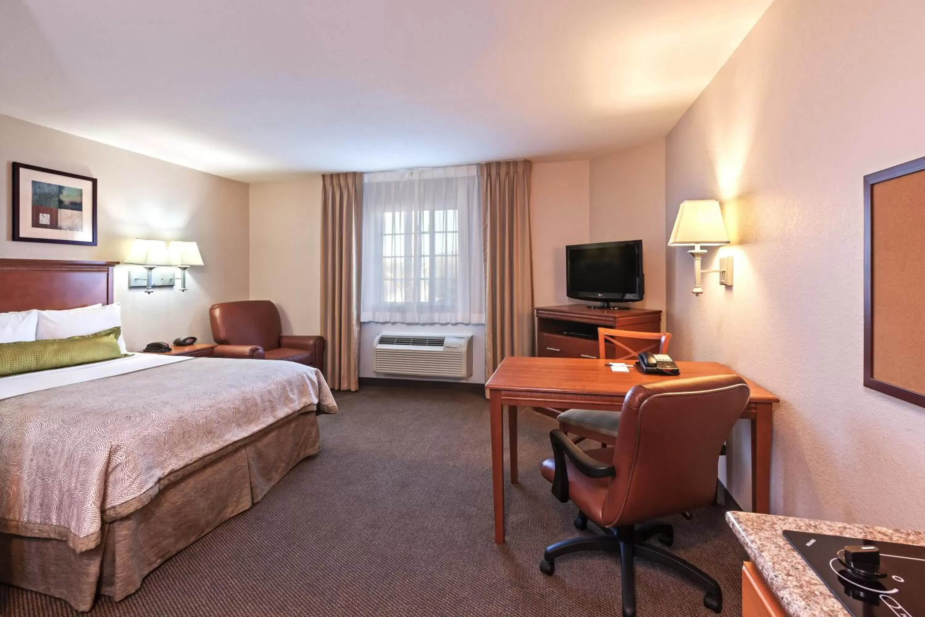 Photo of the whole room, TV/Entertainment Center in Candlewood Suites Pearland, an IHG Hotel