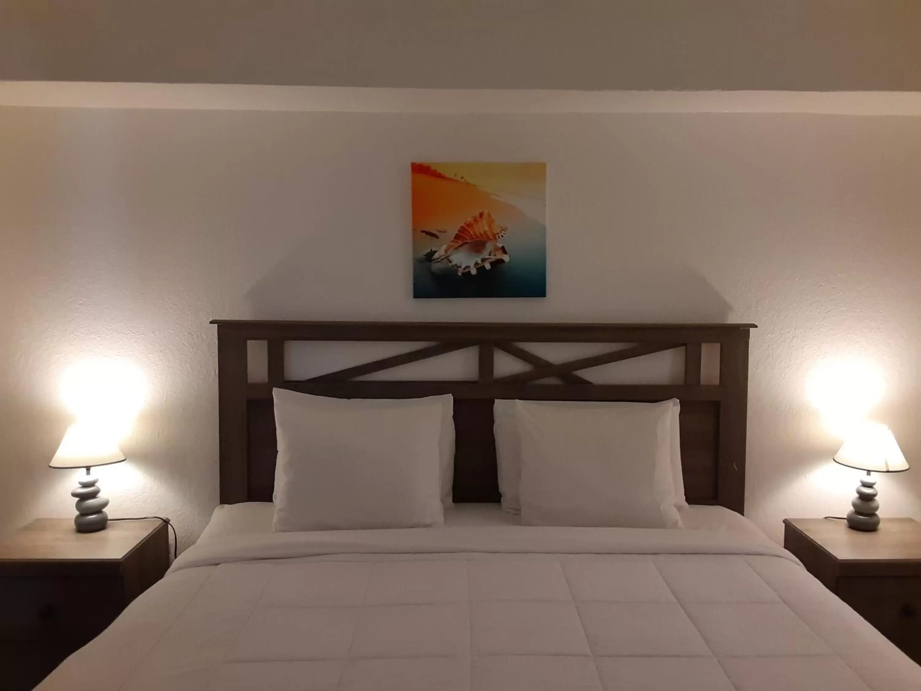 Bed in Sandalwood Beach Resort