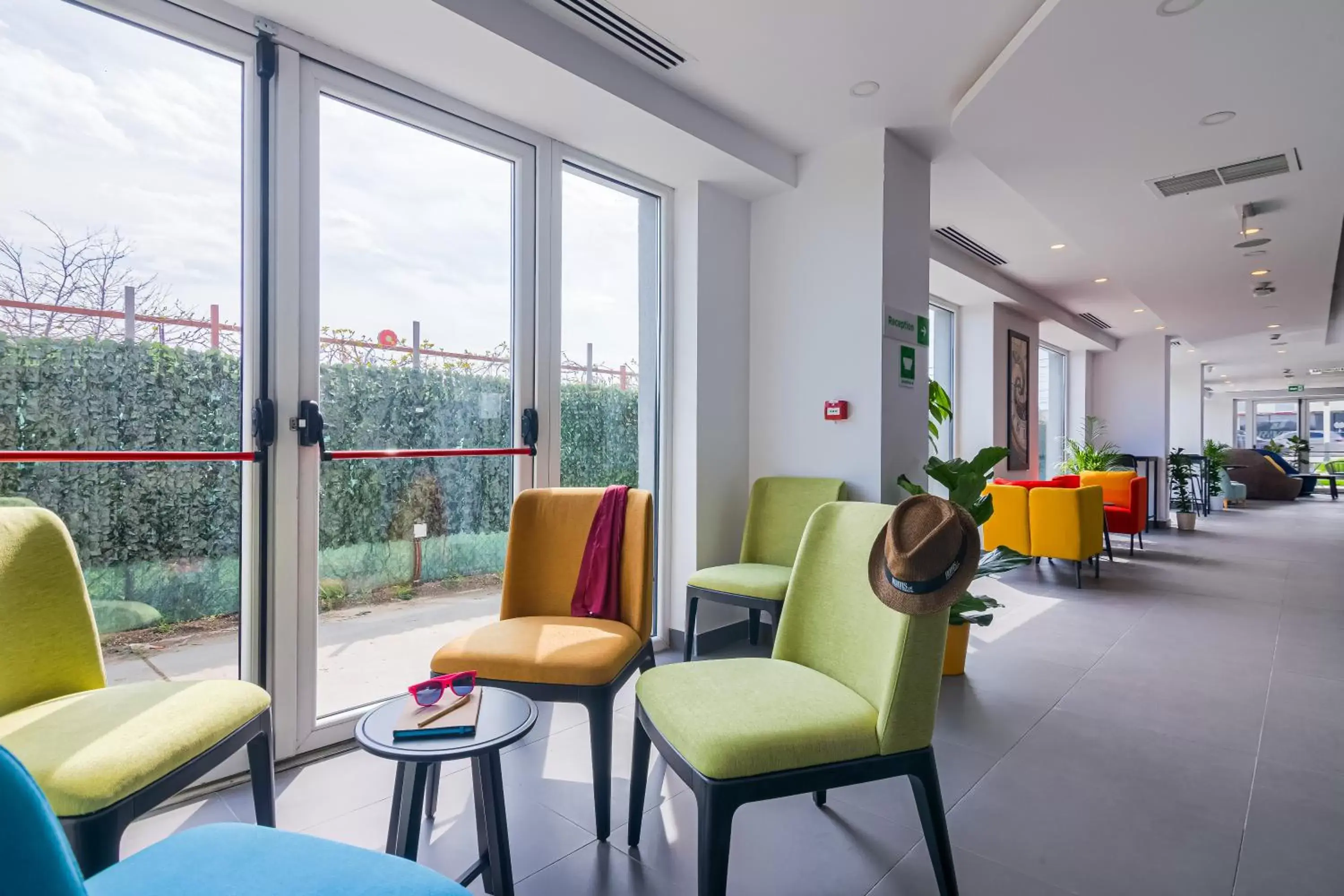 Seating area in Ibis Styles Bucharest Airport