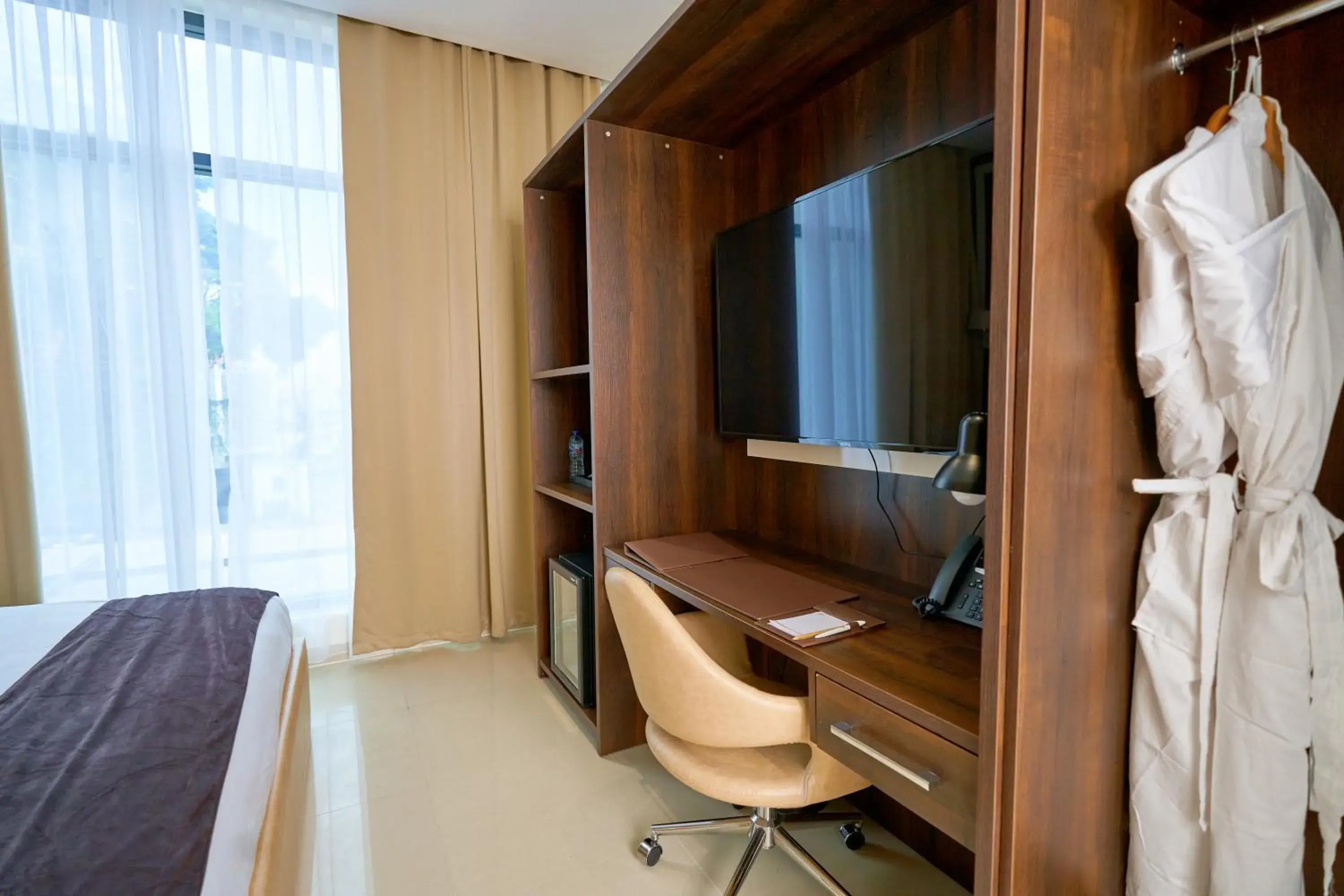 TV and multimedia, Bed in Monty Suites Lekki TV and multimedia, Bed in Monty Suites Lekki