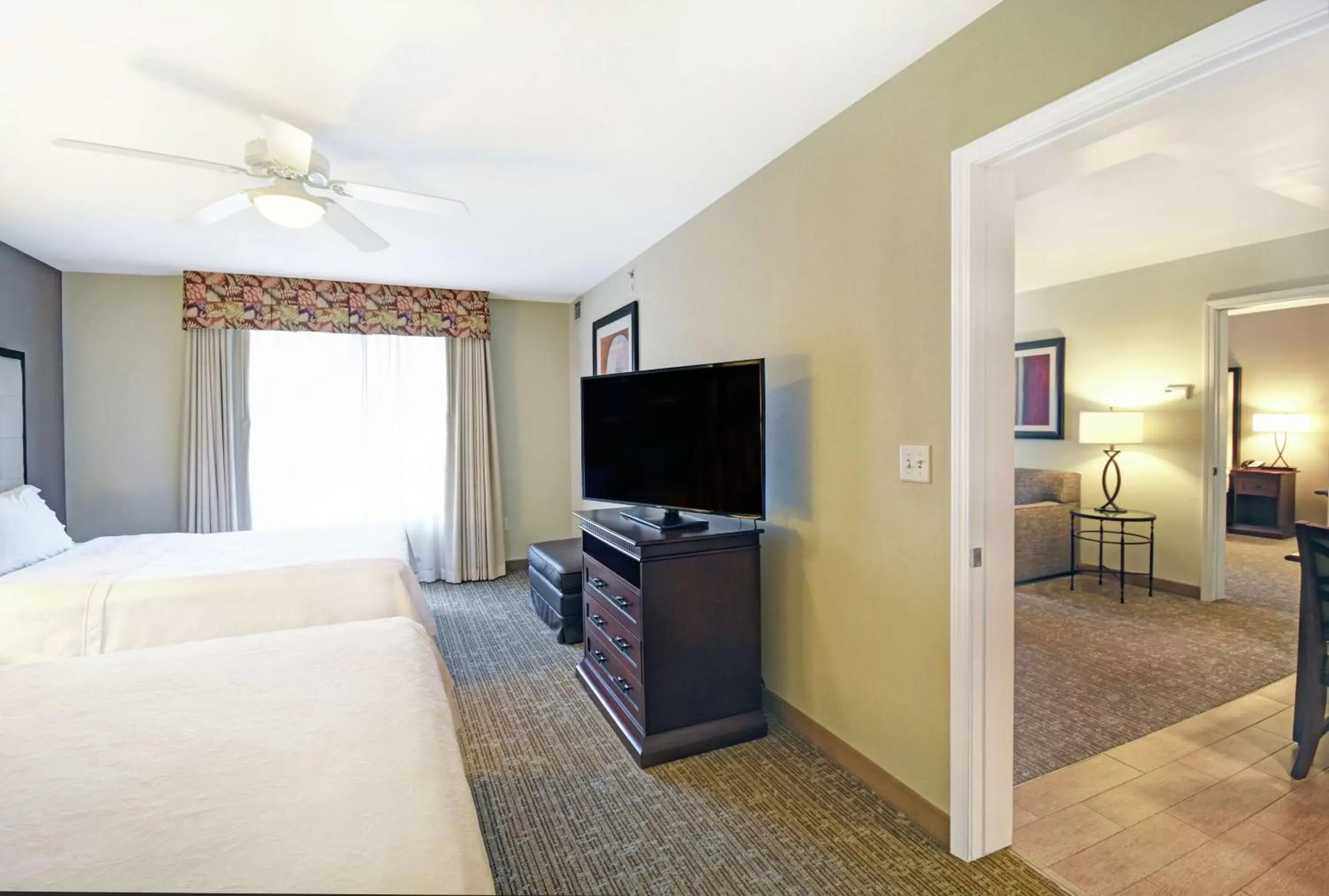 Bedroom, TV/Entertainment Center in Homewood Suites by Hilton Denver International Airport