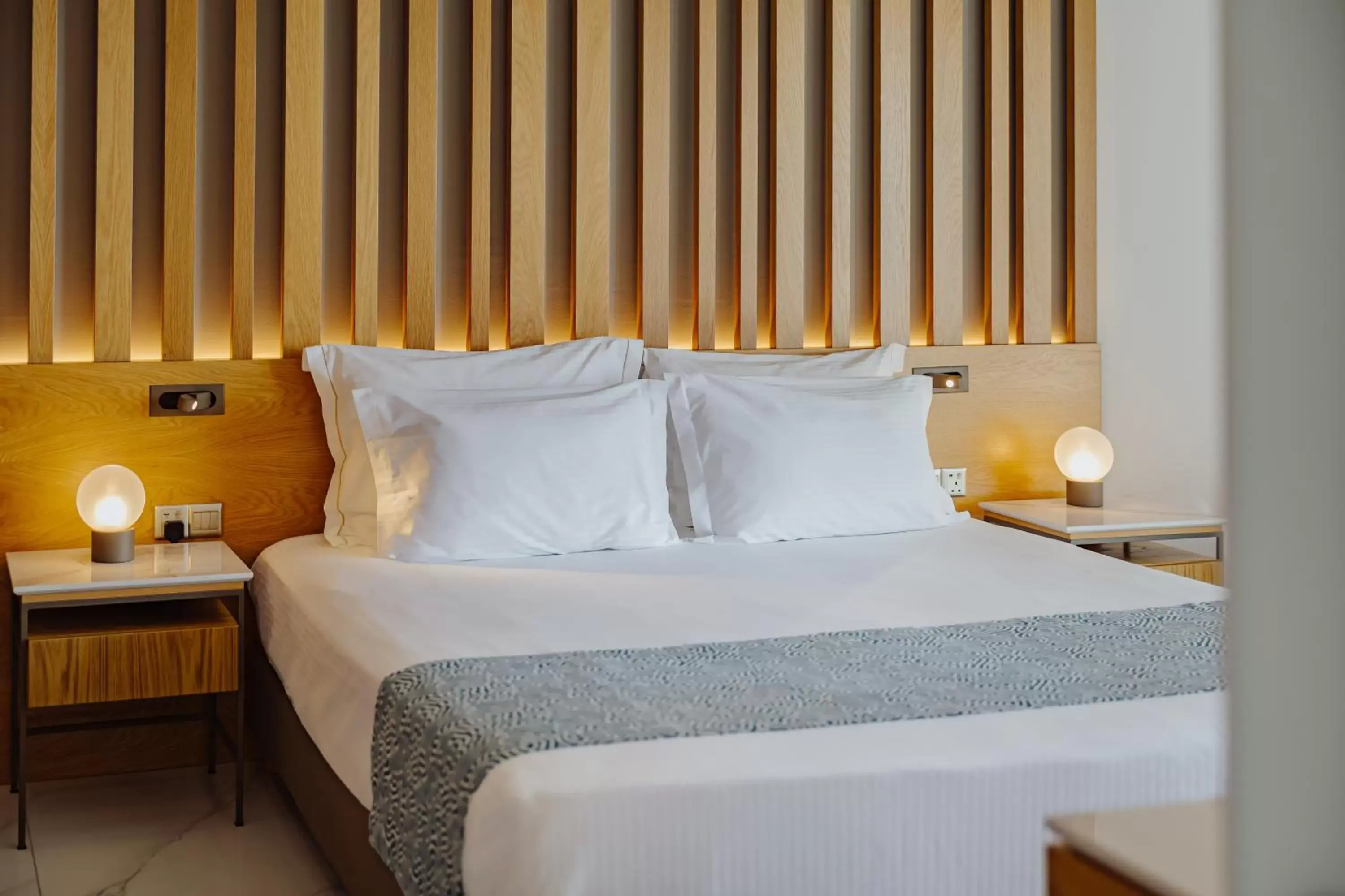 Bed in Golden Bay Beach Hotel
