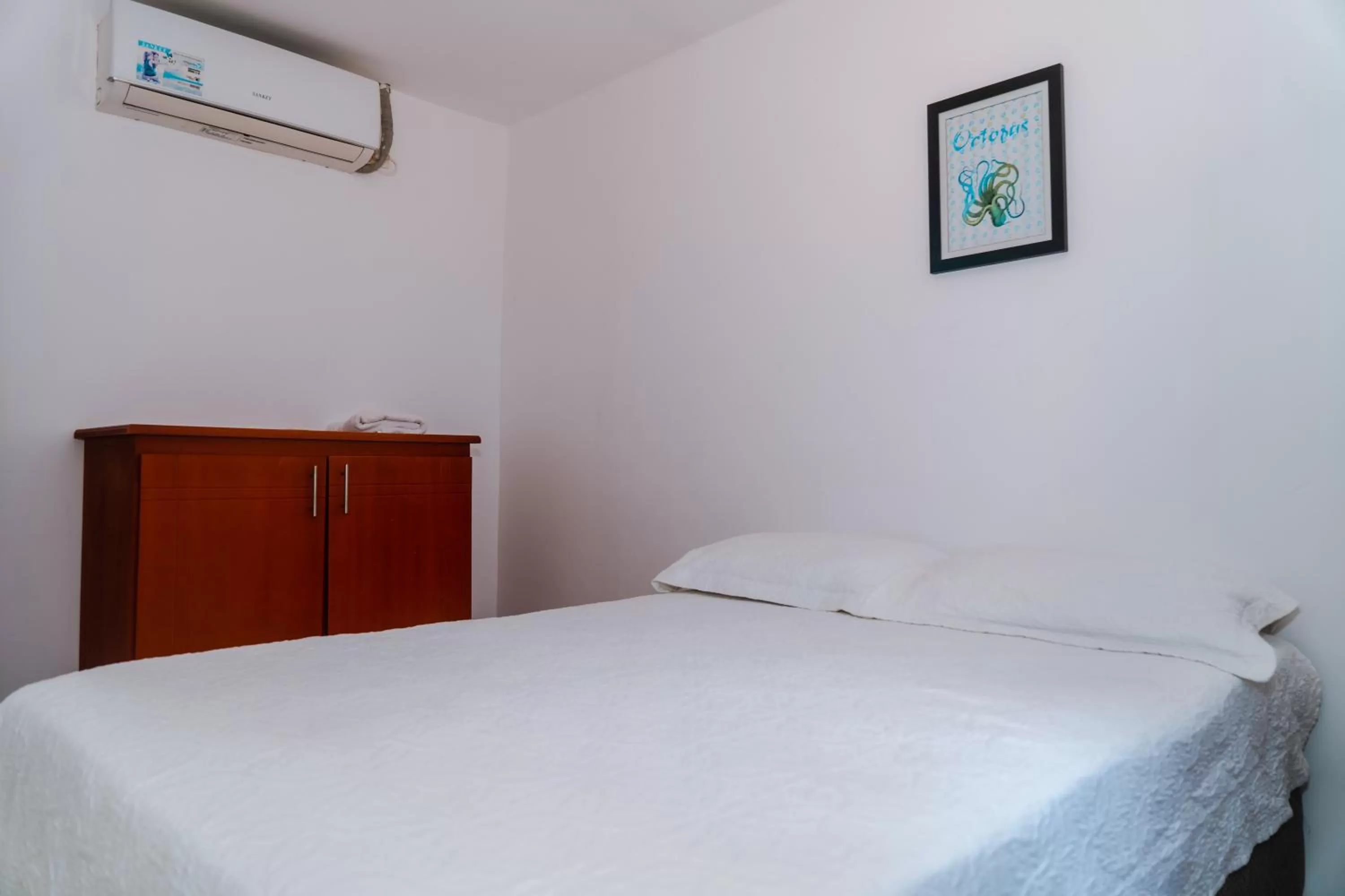 Bed in ZOJO MARiNA BAY