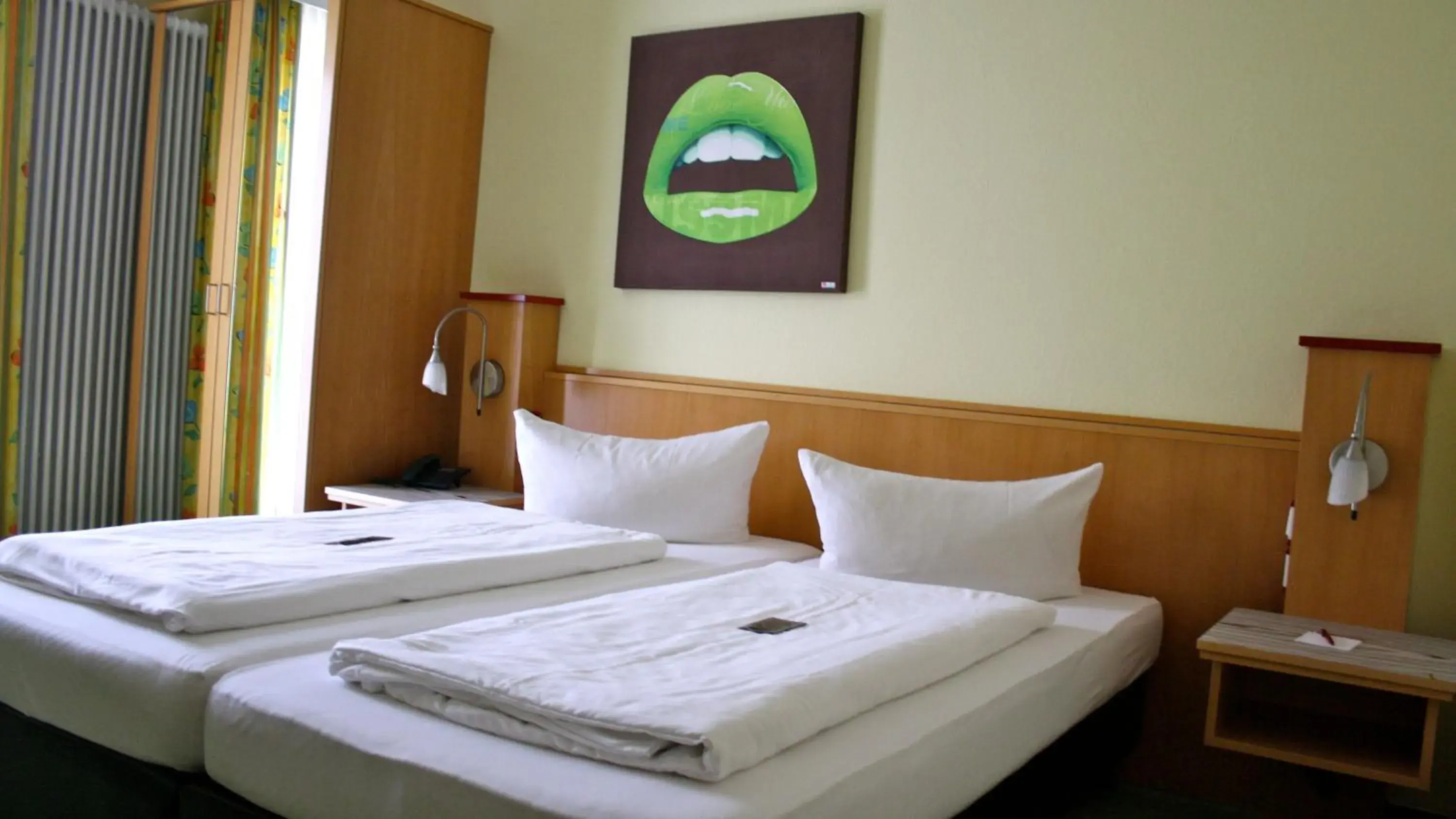 Bed in Hotel Garni Elegant