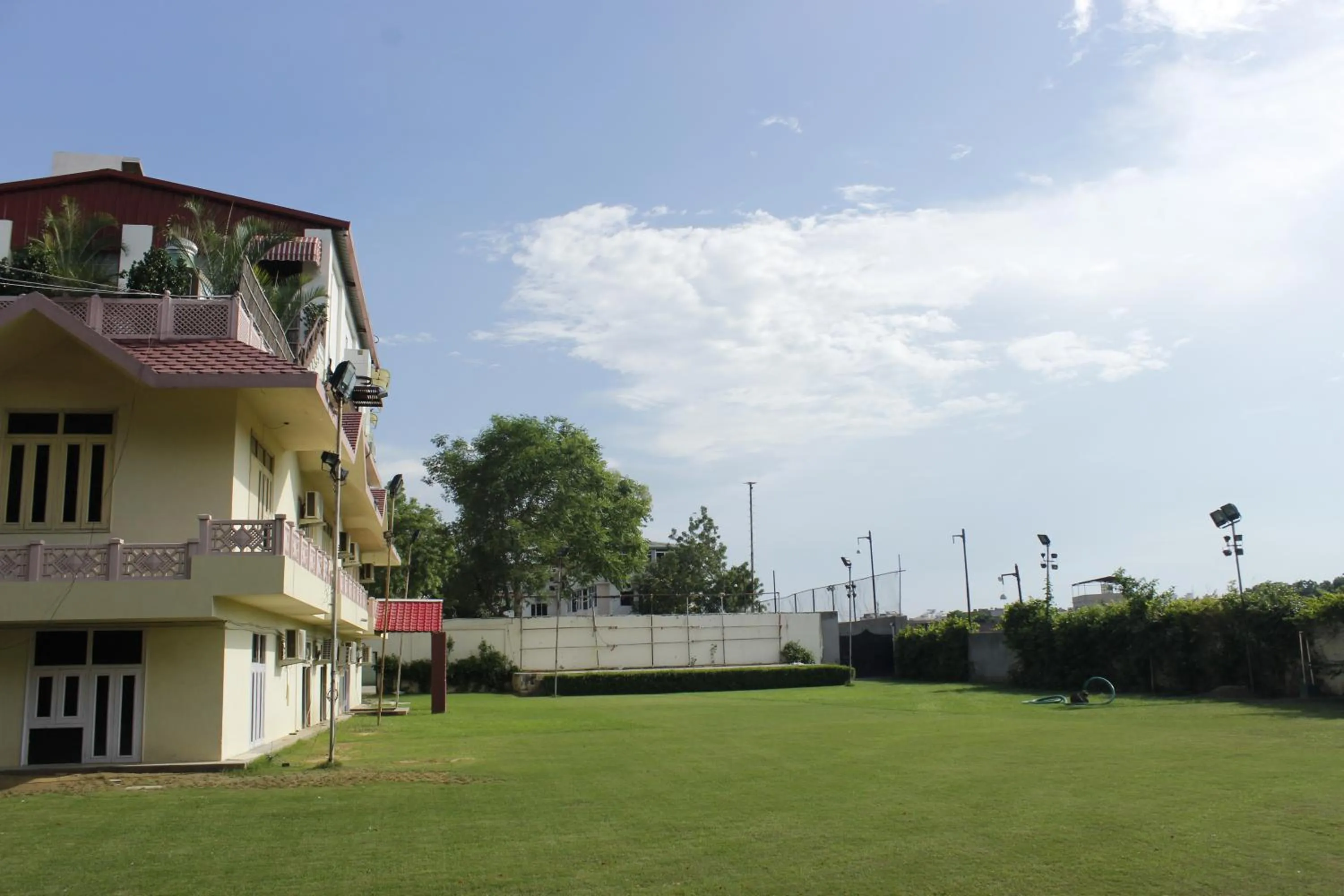 Tennis court in The Byke Grassfield Resort with Outdoor Pool, Shyam Nagar, Jaipur