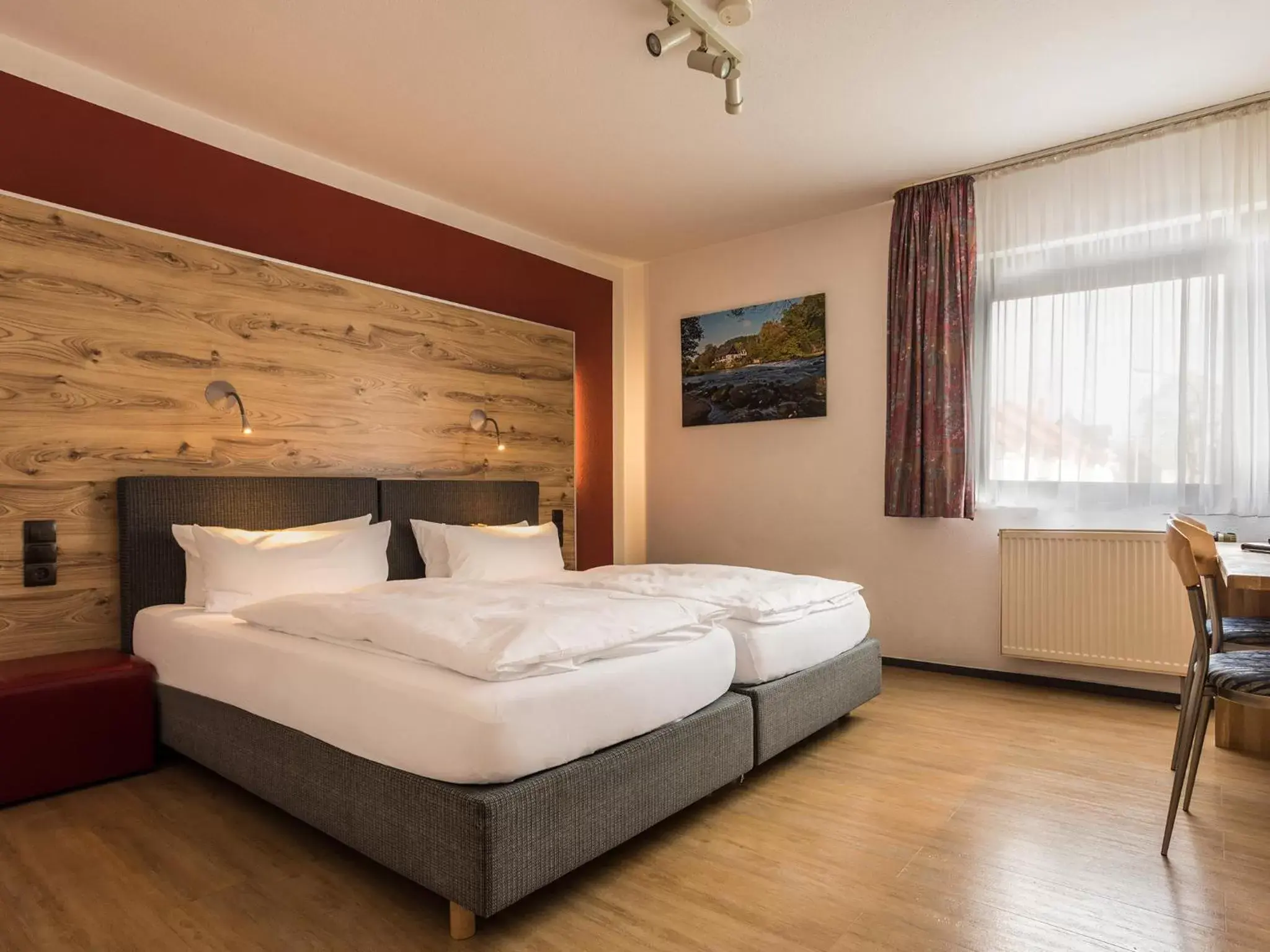 Triple Room - single occupancy in Hotel & Wirtshaus Hansen Triple Room - single occupancy in Hotel & Wirtshaus Hansen