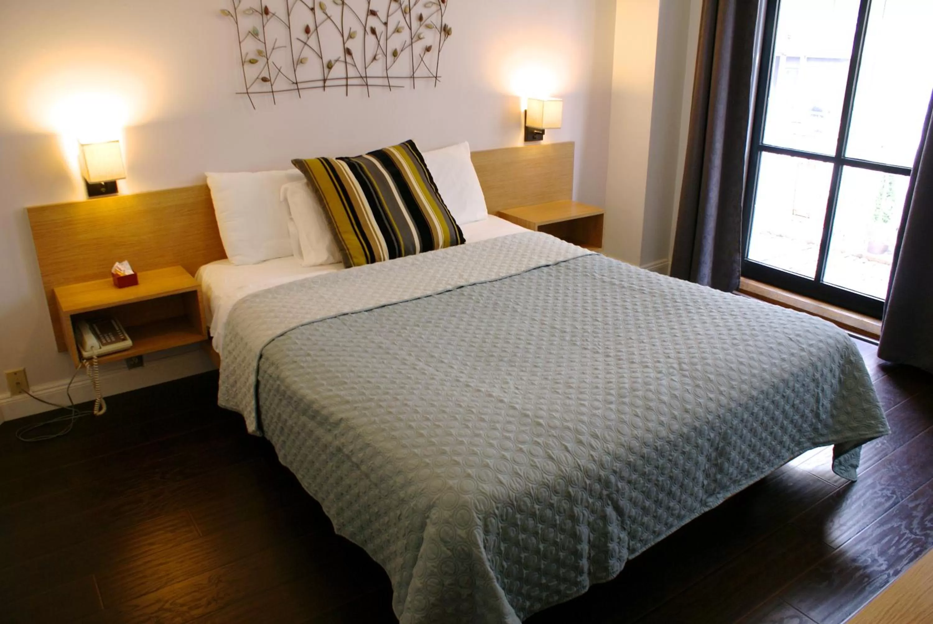 Bed in Touchstone Hotel - City Center