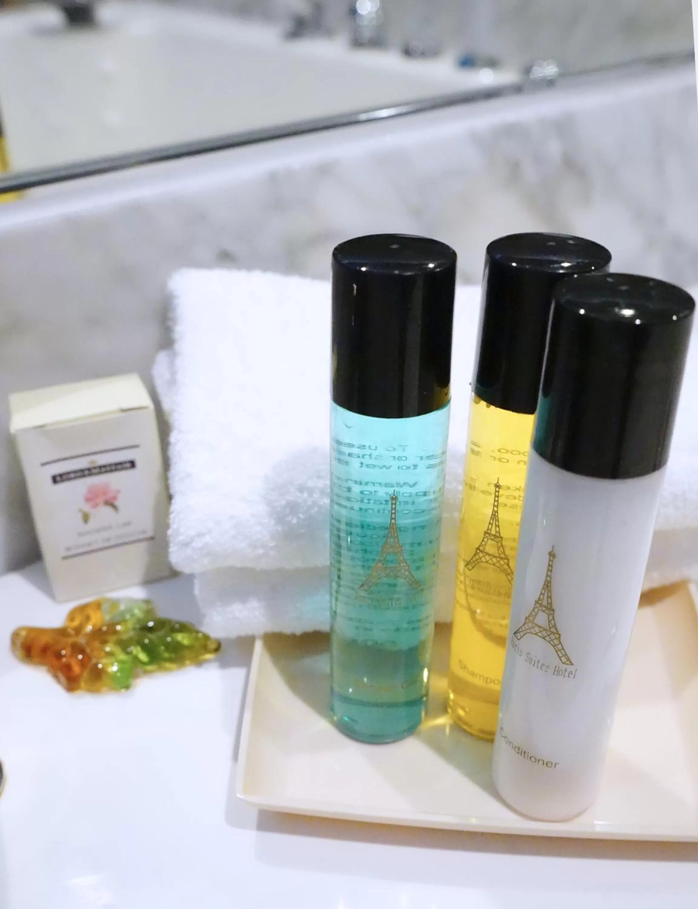 Bathroom in Paris Suites Hotel