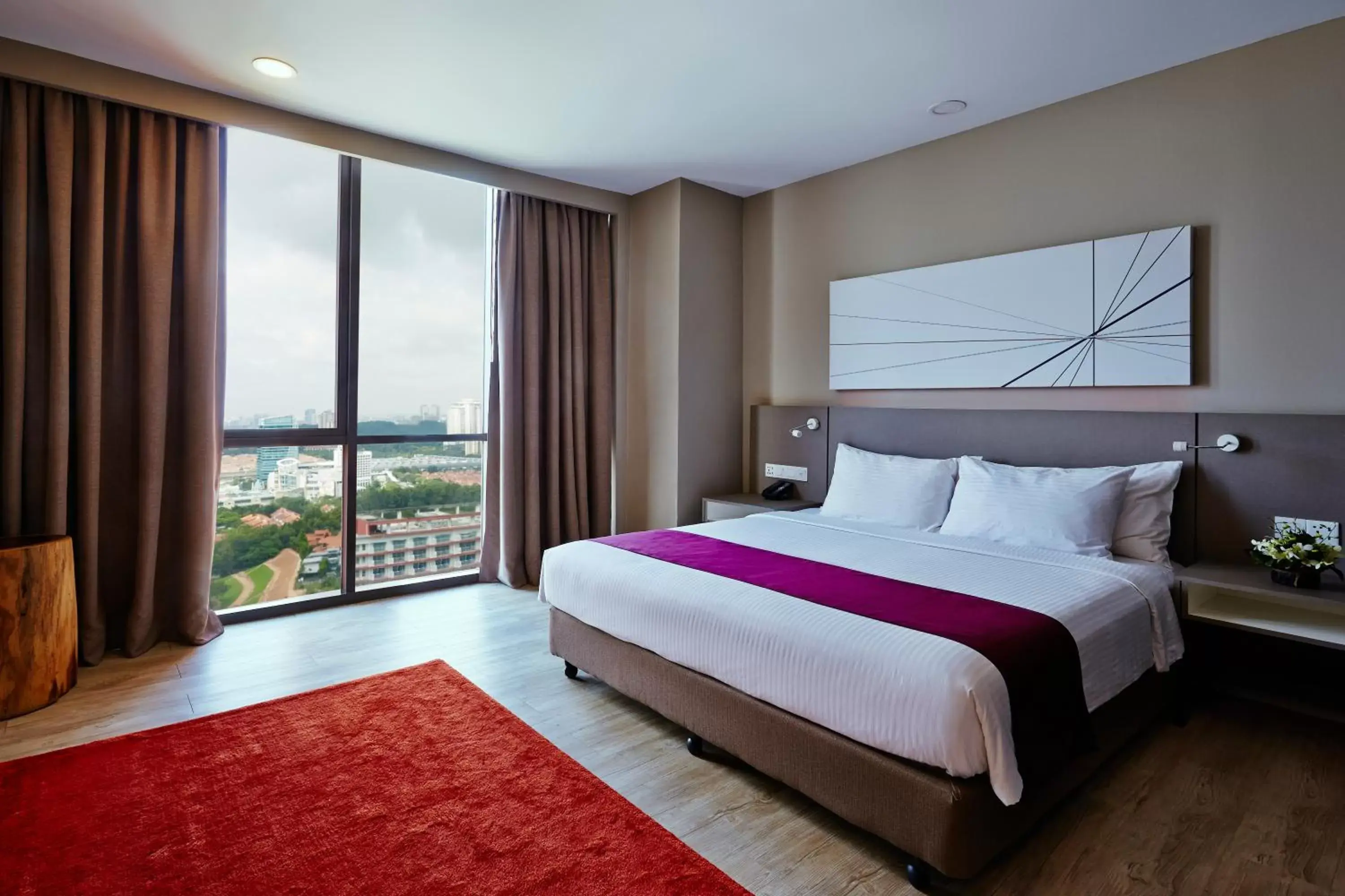 Bed in Qliq Damansara Hotel