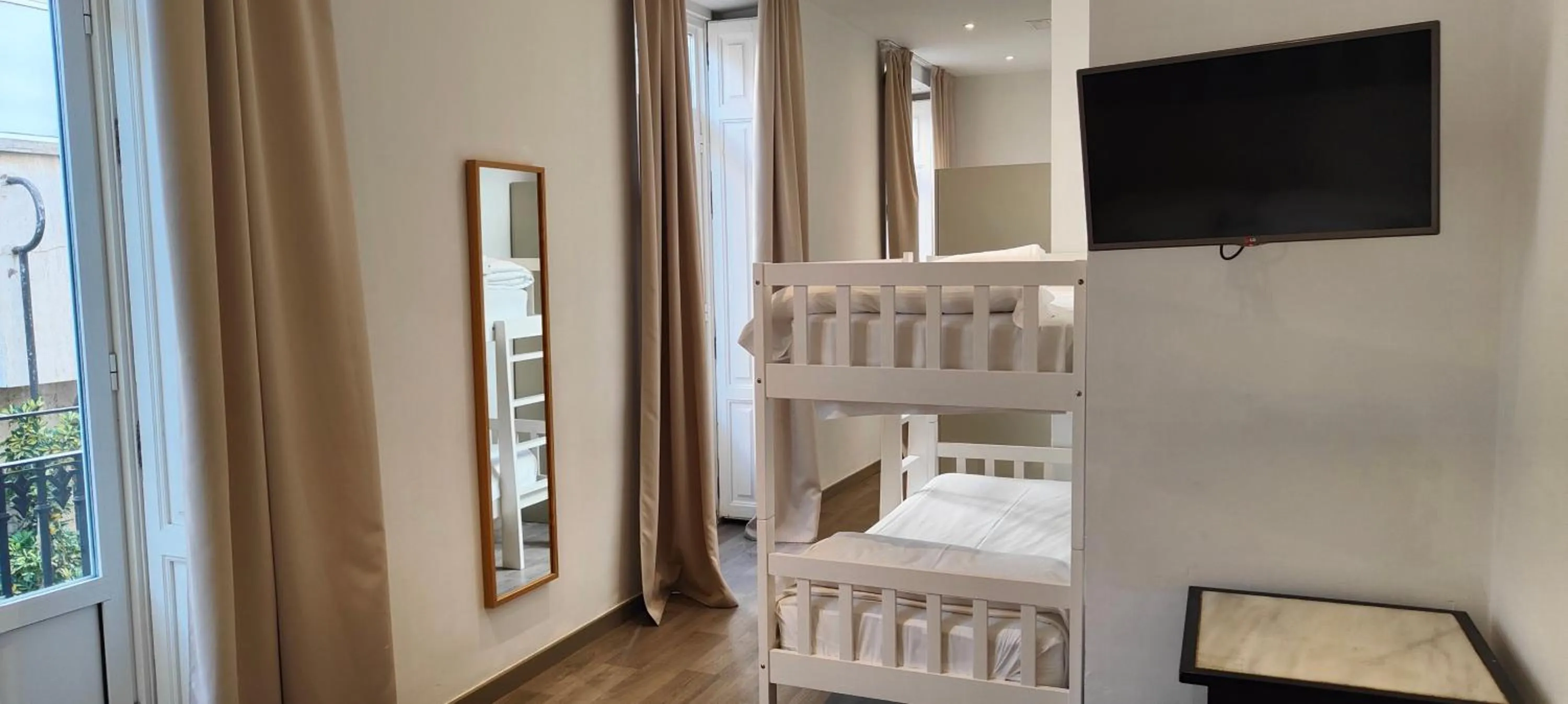 Bed in Hotel San Lorenzo Boutique Plaza