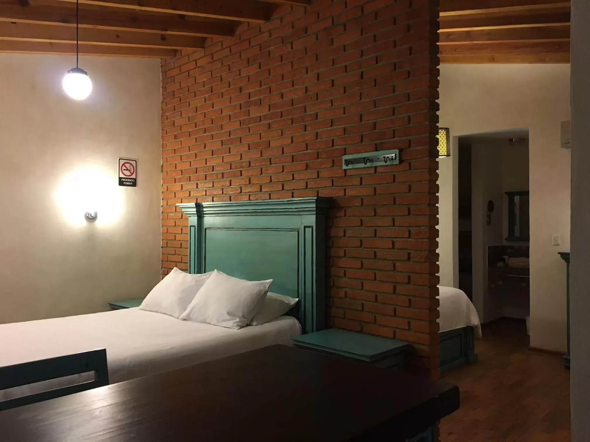 Photo of the whole room, Bed in Hacienda Soltepec Suites Campo de Golf