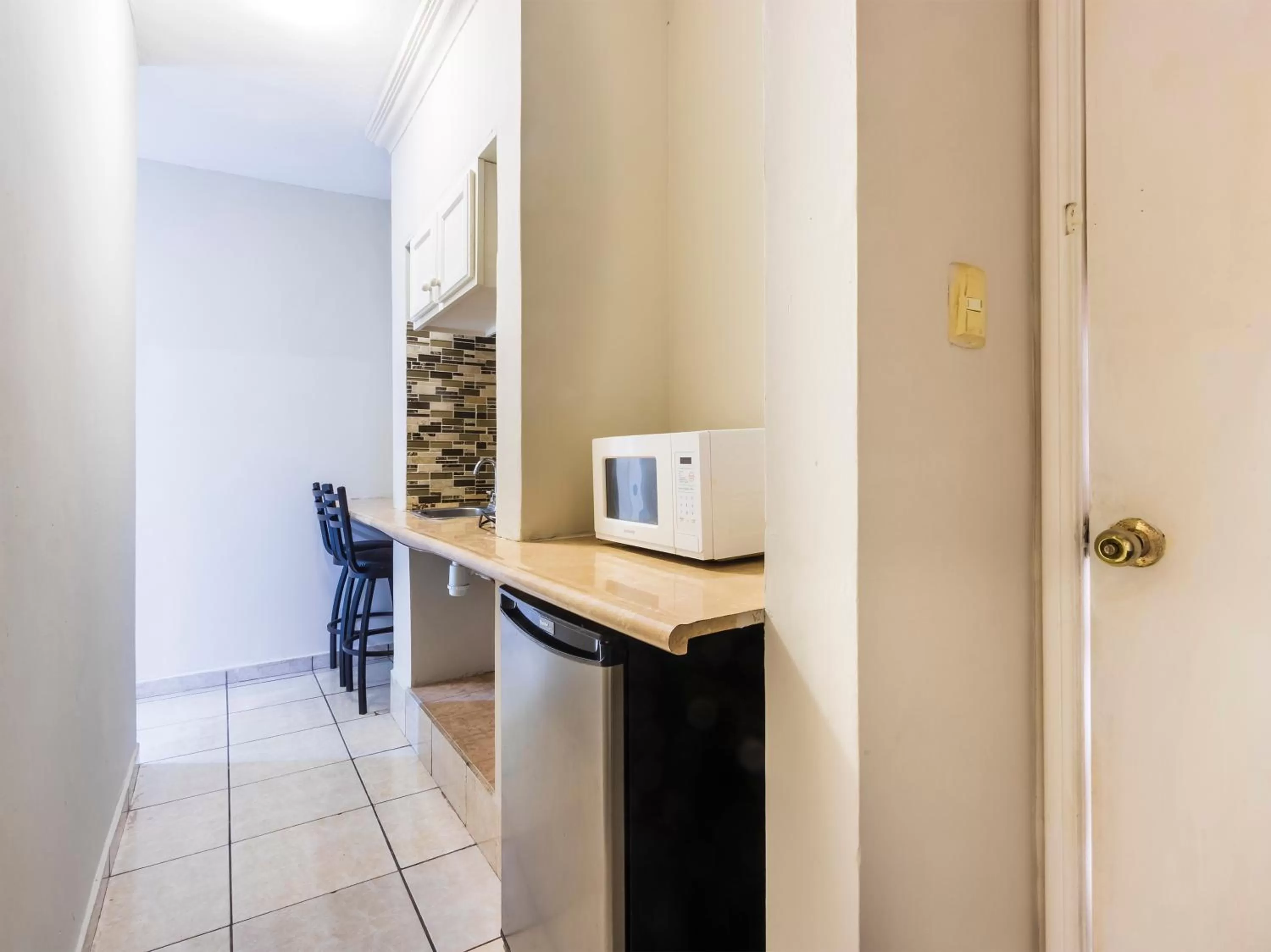 Seating area in Boca Inn Hotel & Suites