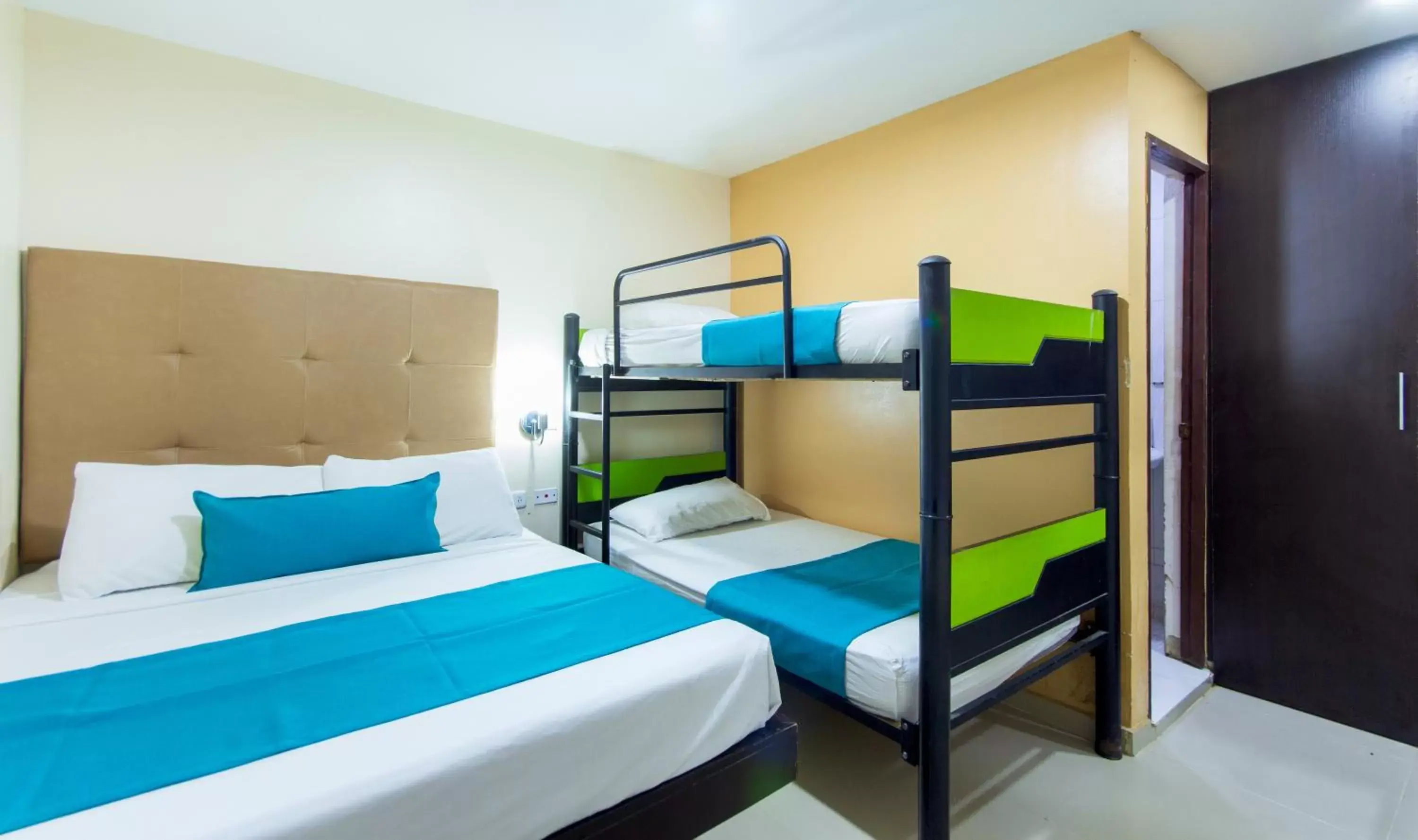 Bed, Bunk Bed in Azuán Suites Hotel By GEH Suites
