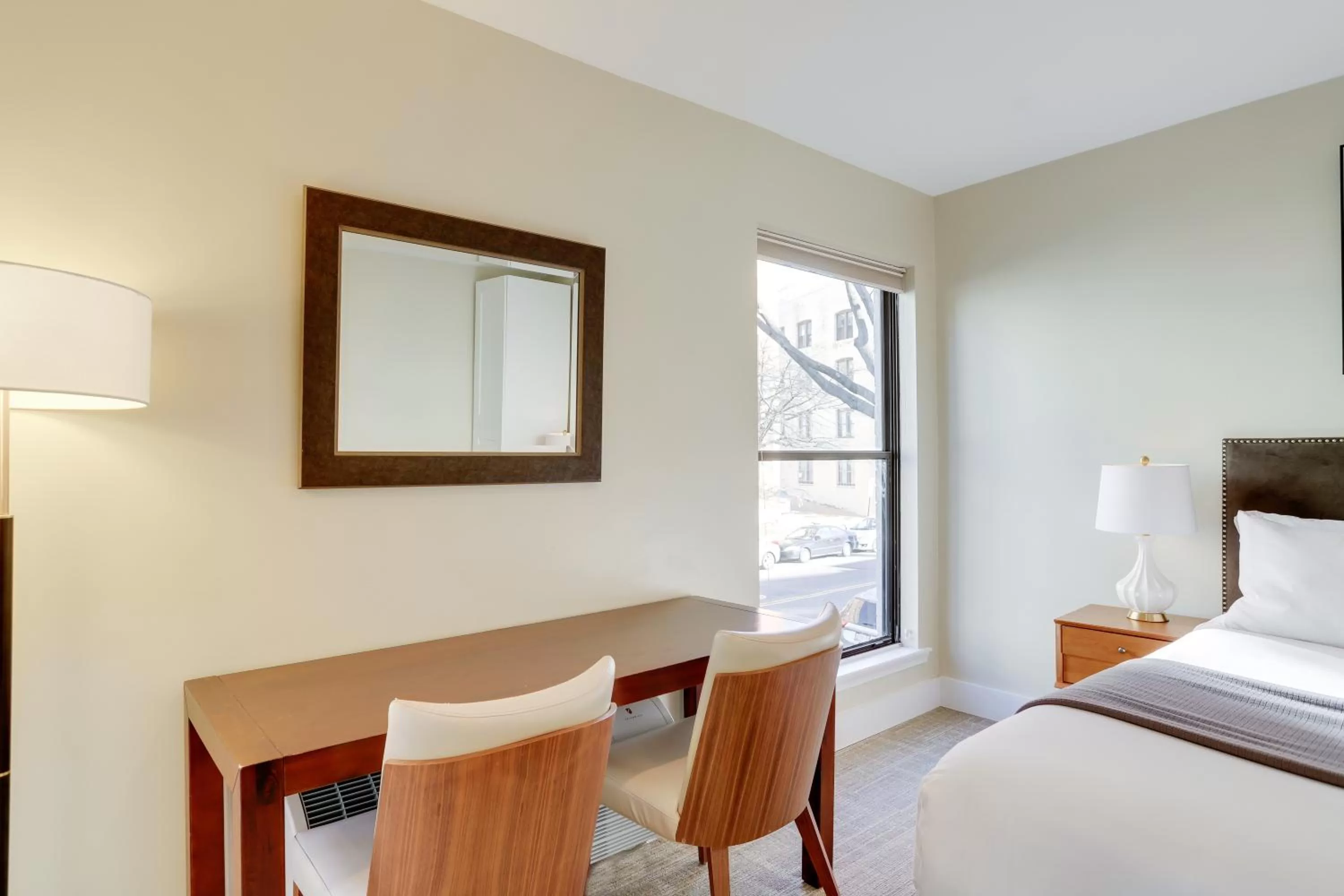 Bed in Sojourn at DuPont Place