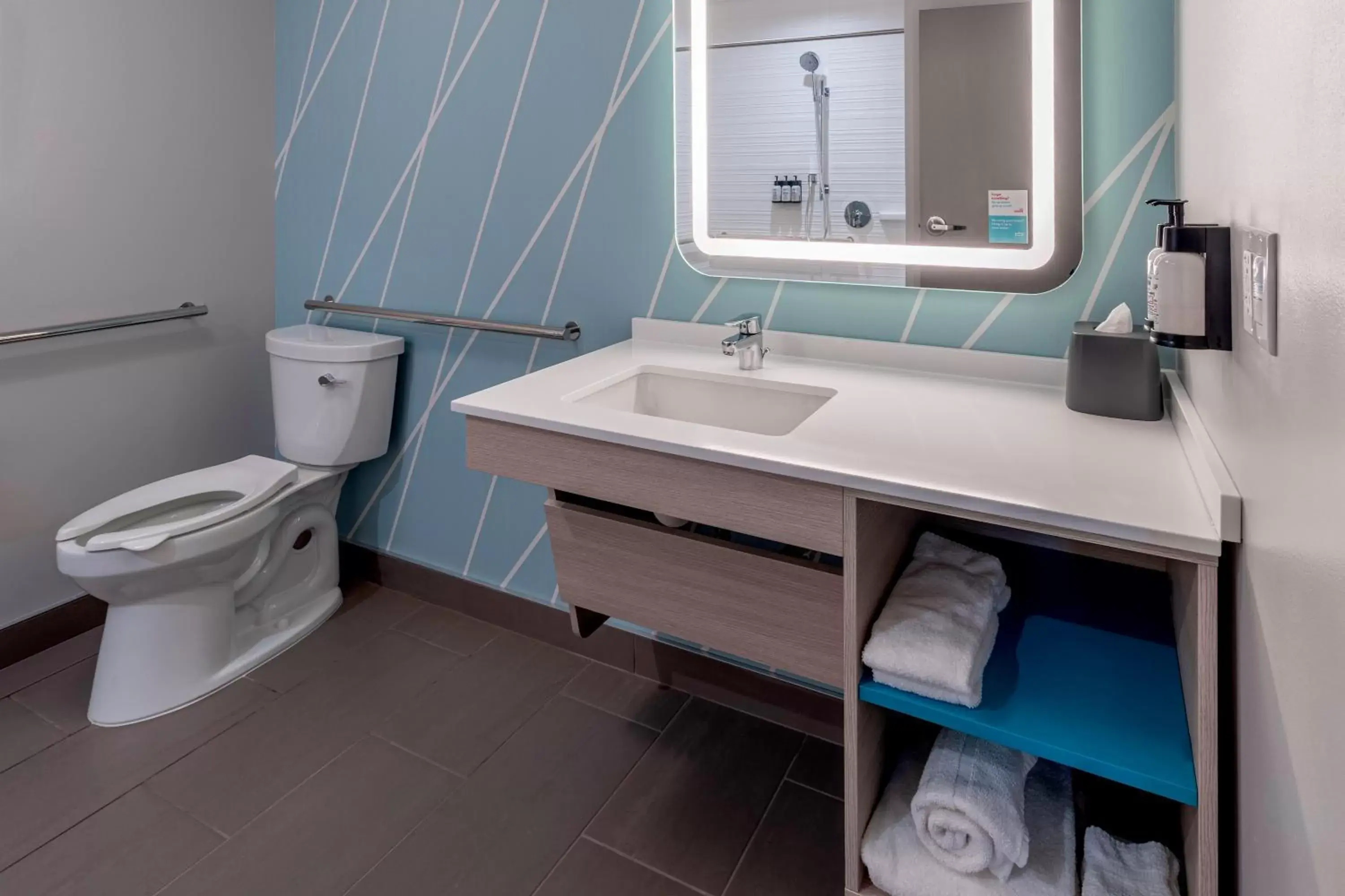 Bathroom in avid hotels Milwaukee West - Waukesha, an IHG Hotel