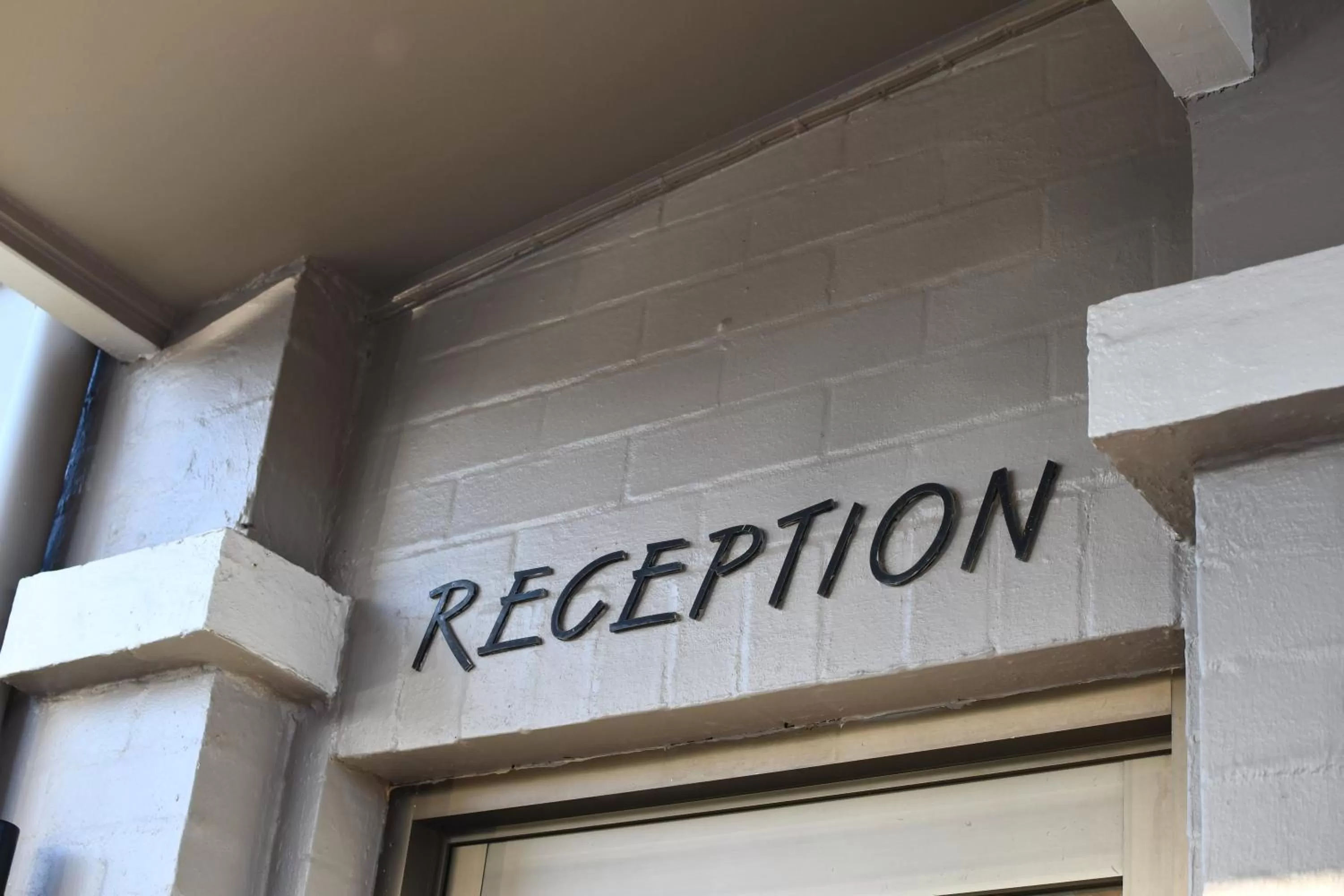 Lobby or reception in The Town House Motor Inn