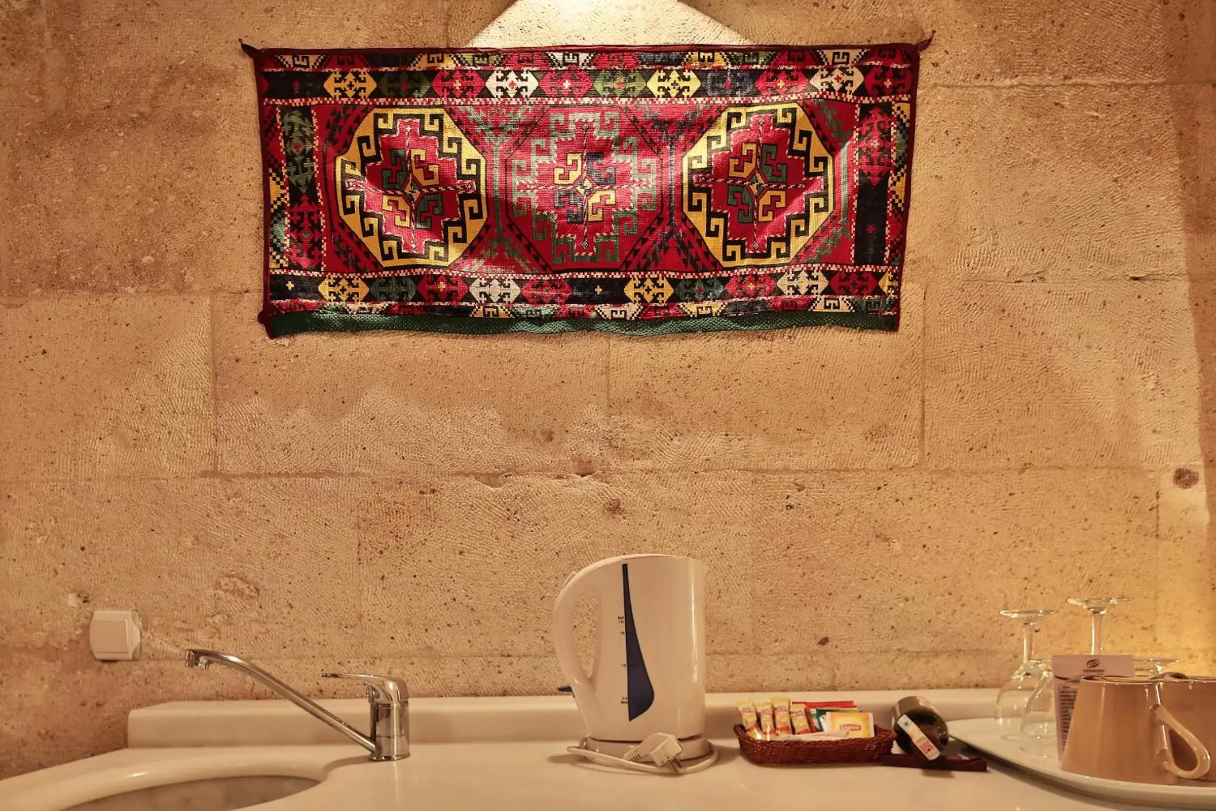 Kitchen or kitchenette in Cappadocia Cave Suites