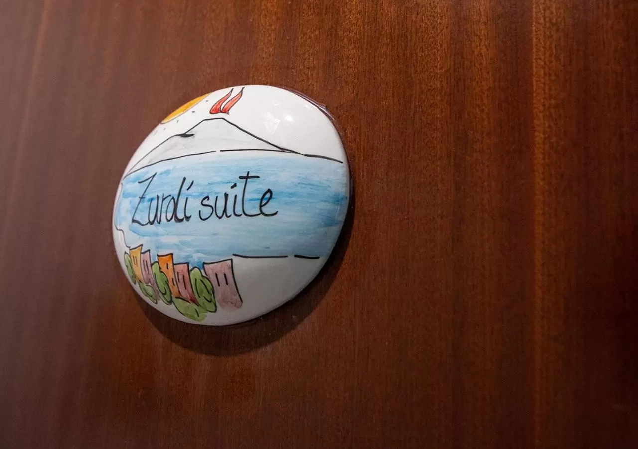 Property logo or sign in zuroli suite