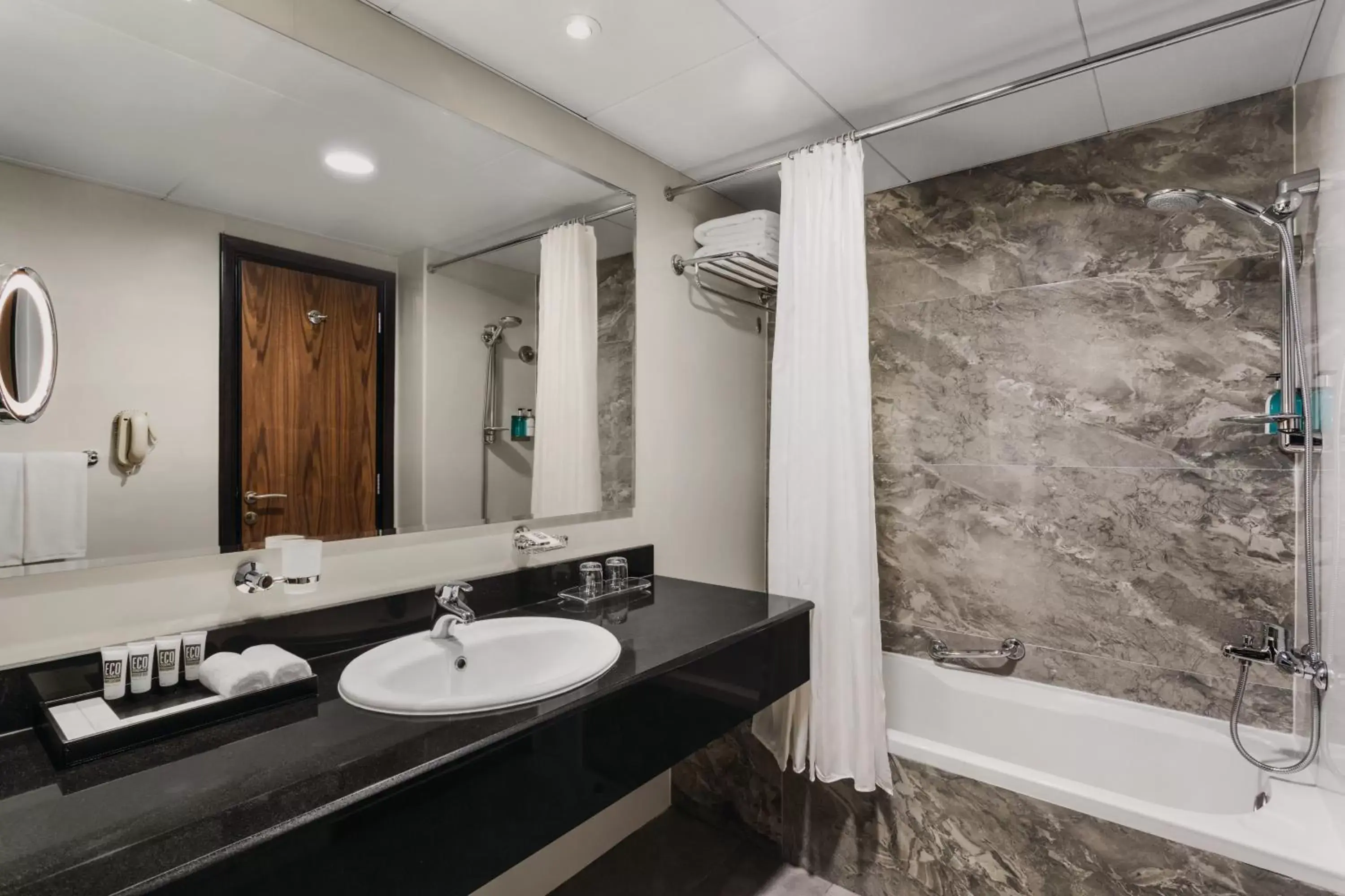 Bathroom in Hawthorn Suites by Wyndham Abu Dhabi City Center