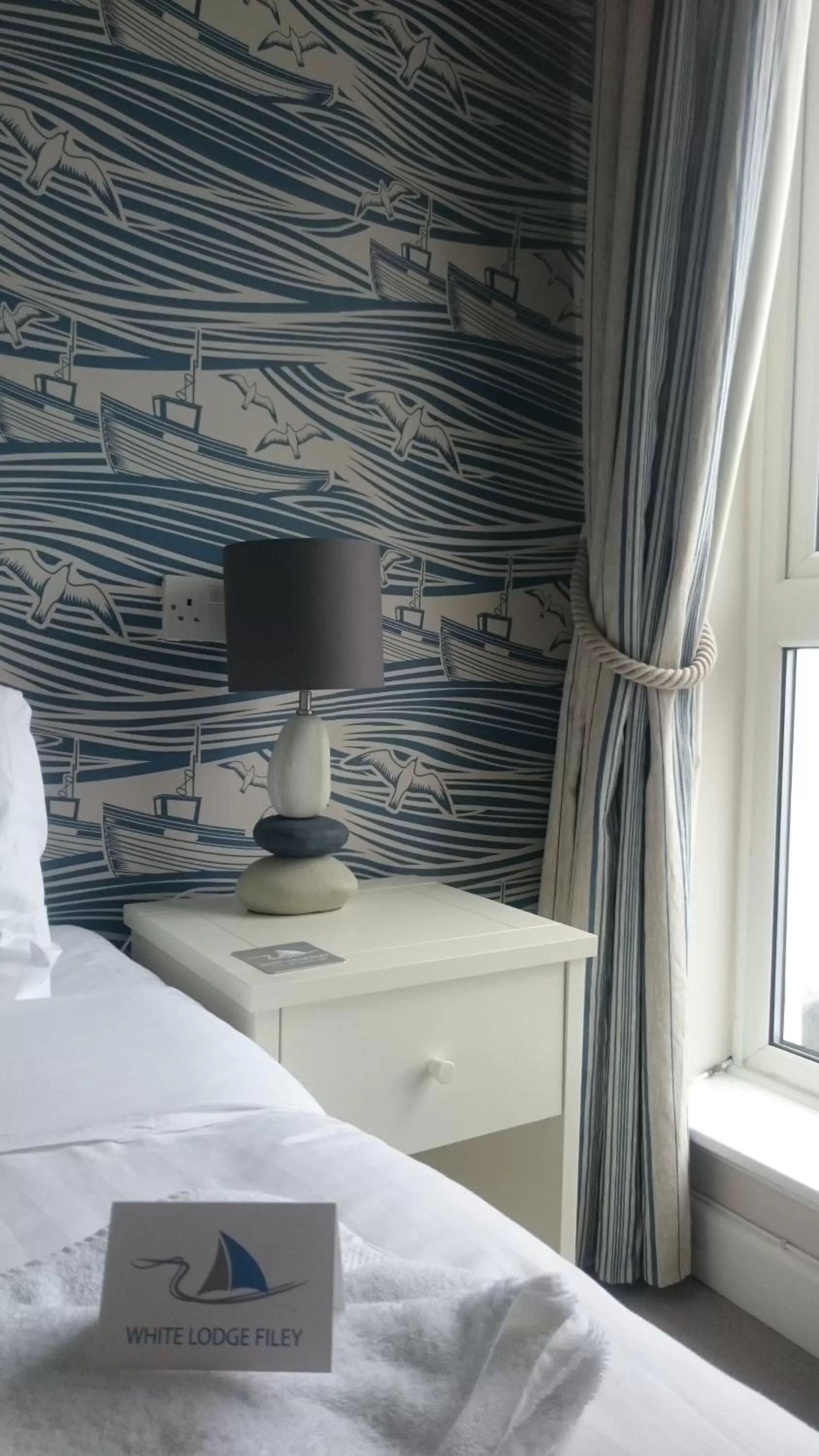 Bed in The White Lodge Hotel