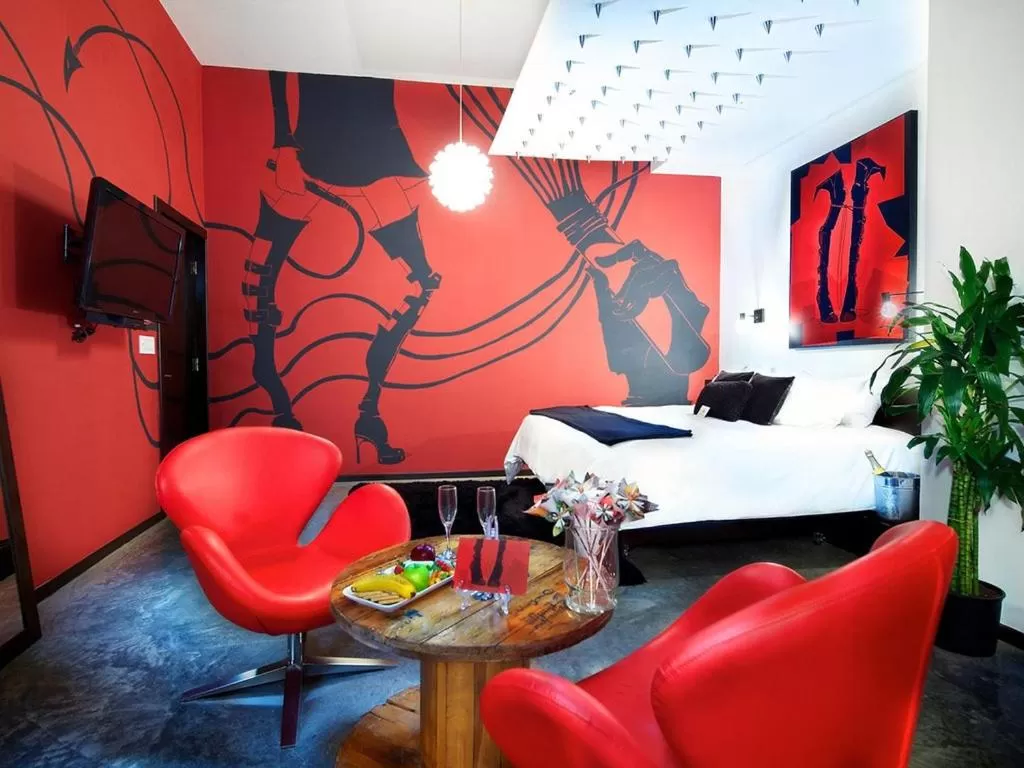 Bed in Tantalo Hotel - Kitchen - Roofbar