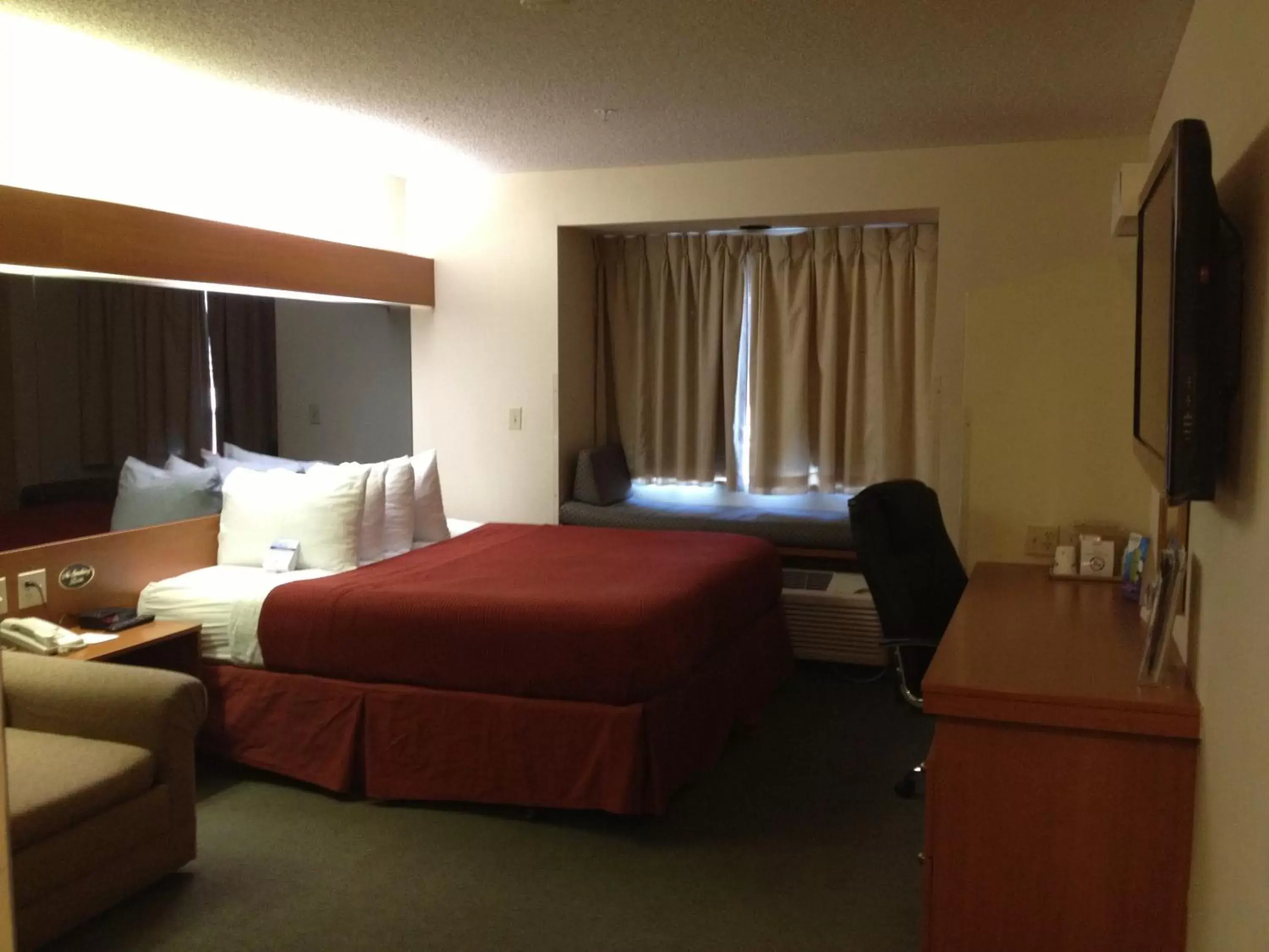 Bed in Microtel Inn & Suites by Wyndham Denver Airport