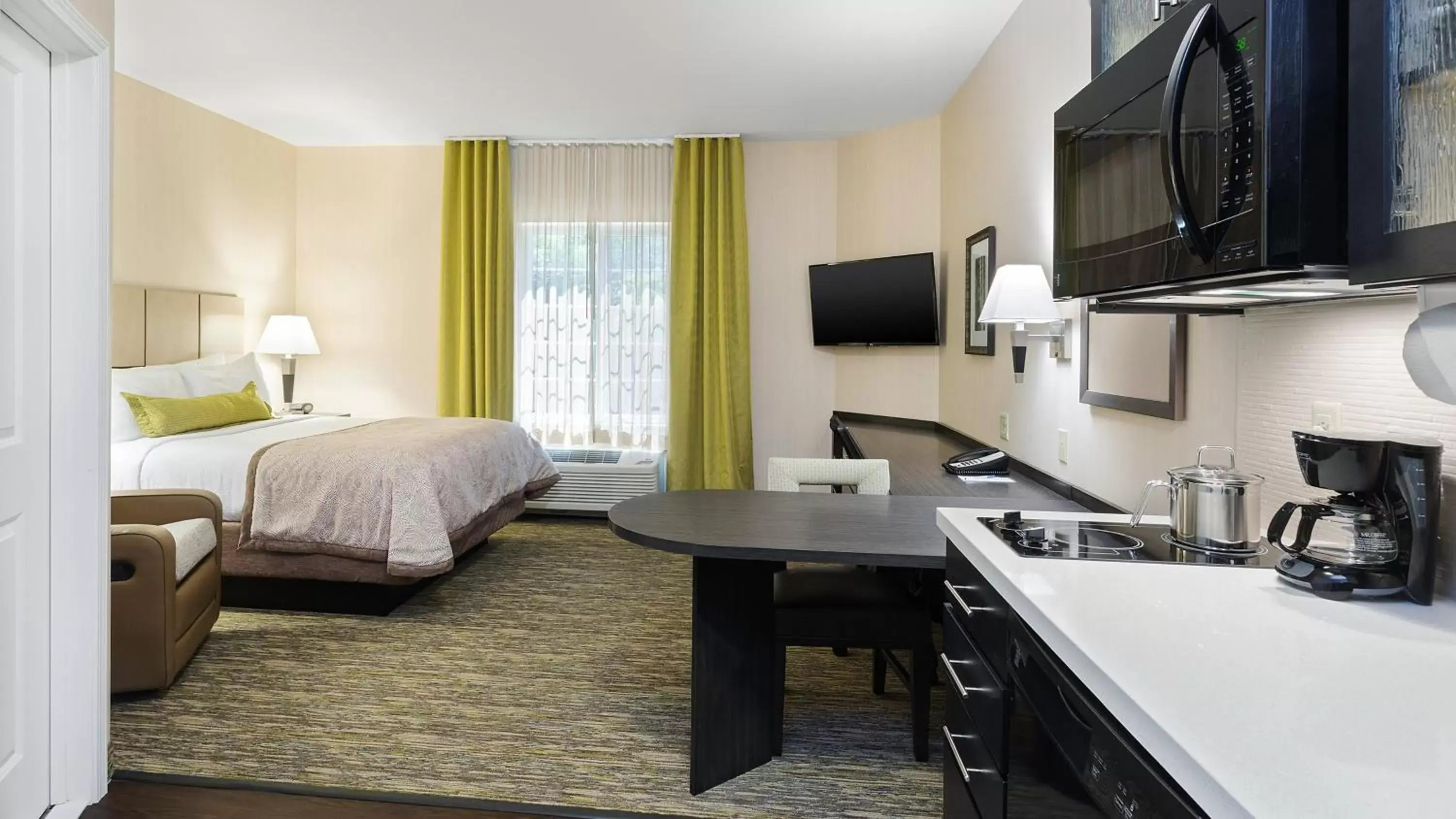Photo of the whole room, Bed in Candlewood Suites Grove City - Outlet Center by IHG Photo of the whole room, Bed in Candlewood Suites Grove City - Outlet Center by IHG