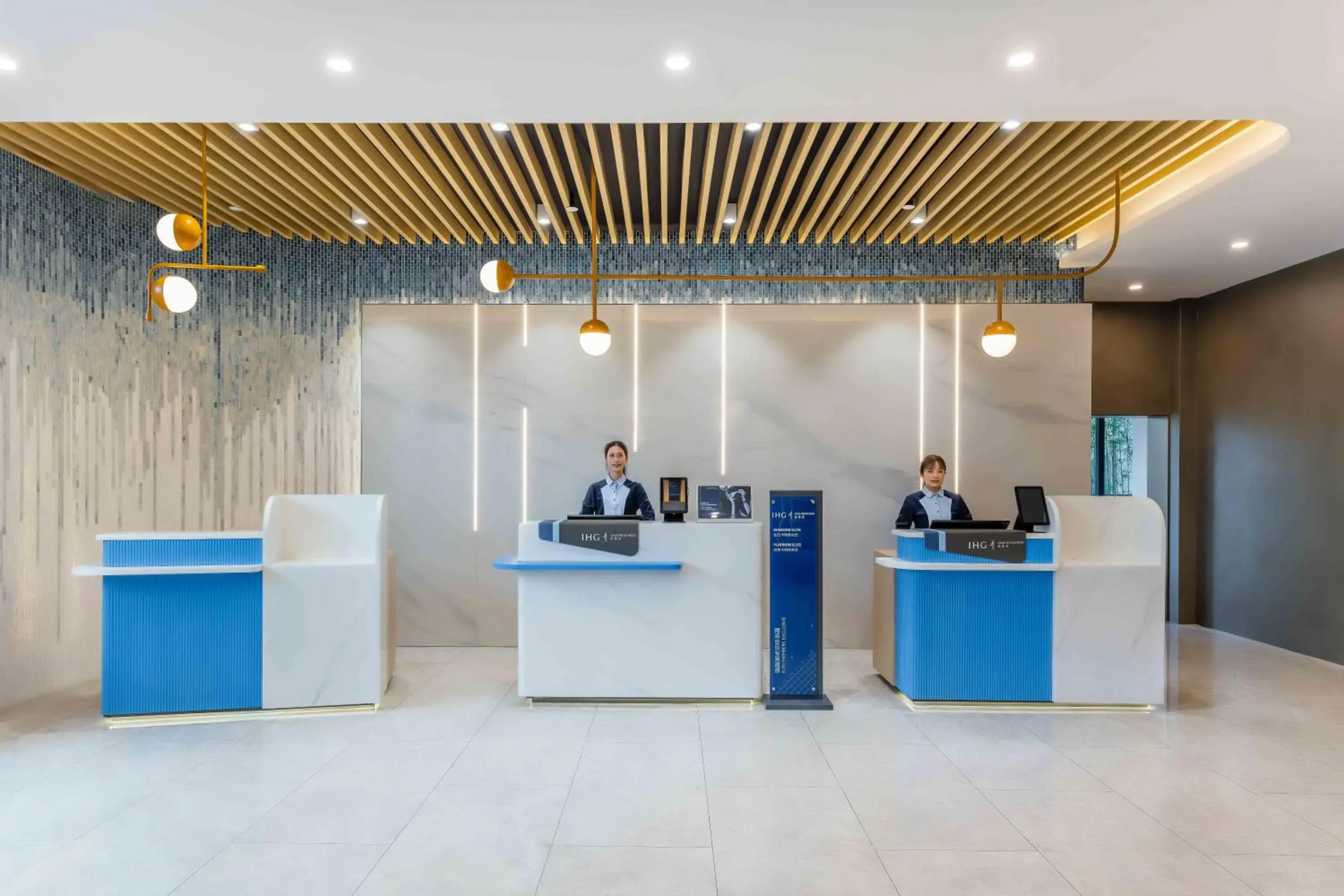 Lobby or reception in Holiday Inn Express Jiangmen East Station by IHG Lobby or reception in Holiday Inn Express Jiangmen East Station by IHG