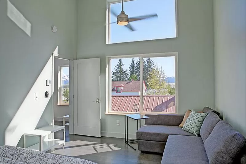Bed, Seating Area in The Vue B&B