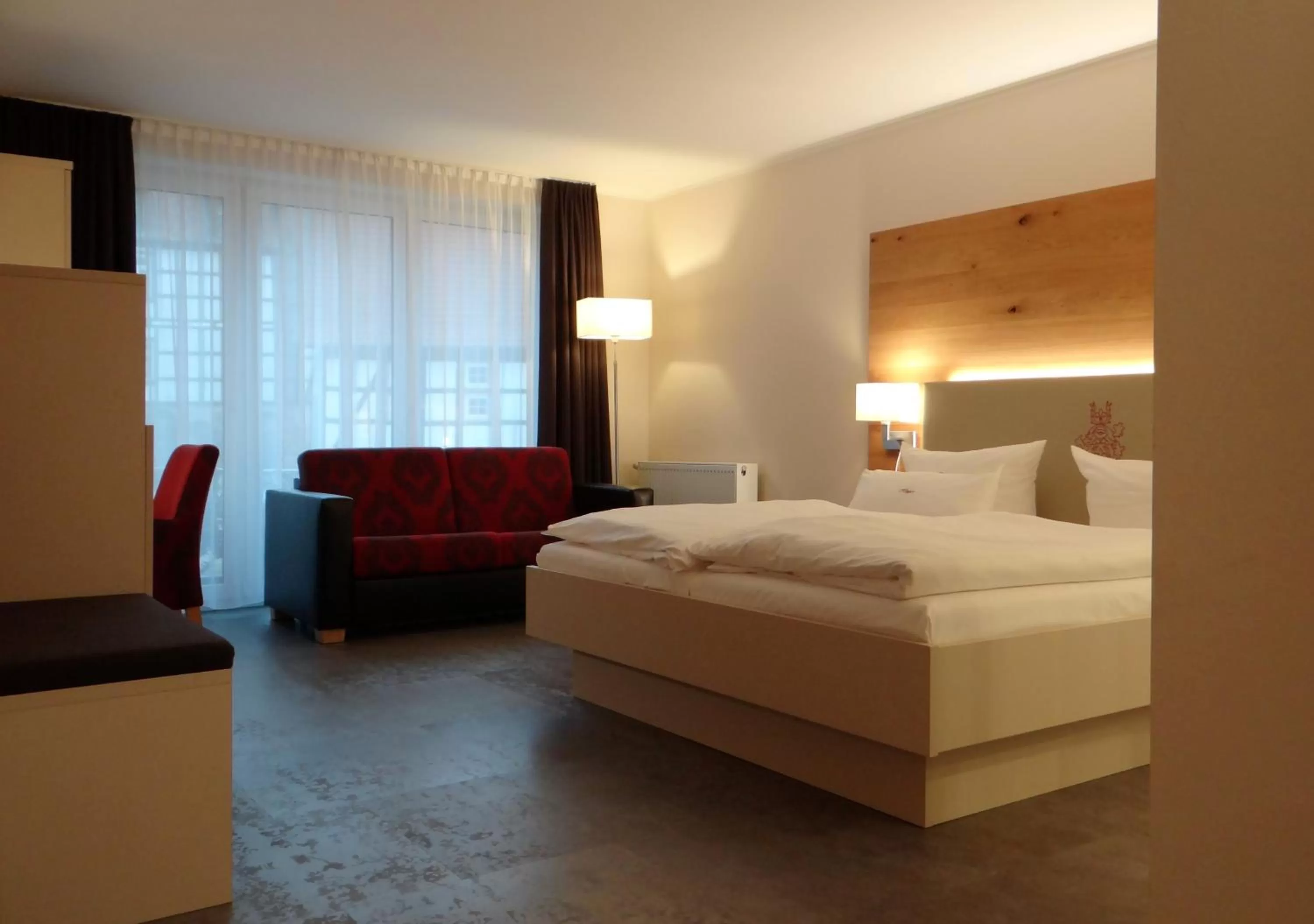 Photo of the whole room, Bed in Höger's Hotel & Restaurant