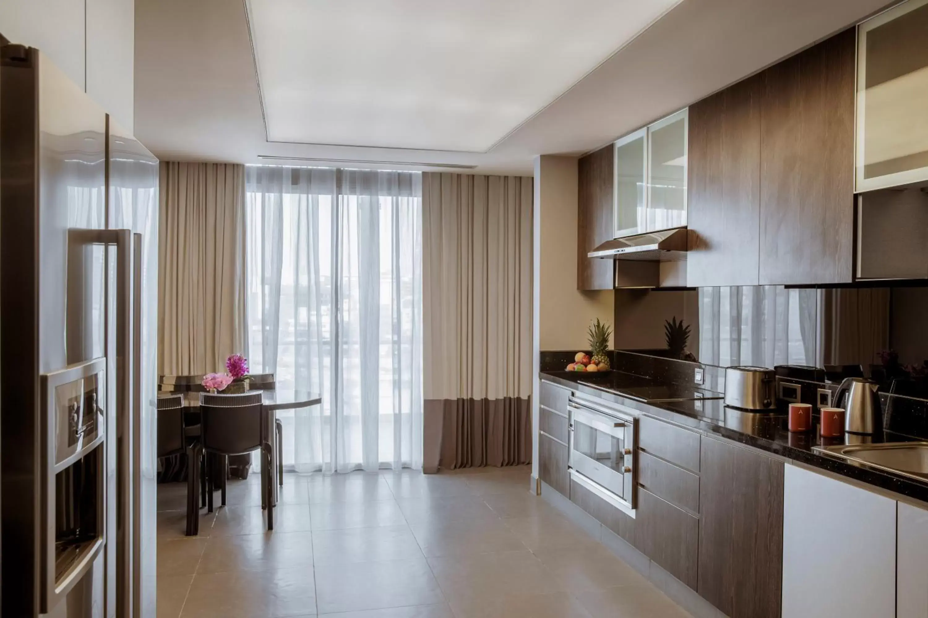 Kitchen or kitchenette, Kitchen/Kitchenette in The Boulevard Arjaan by Rotana